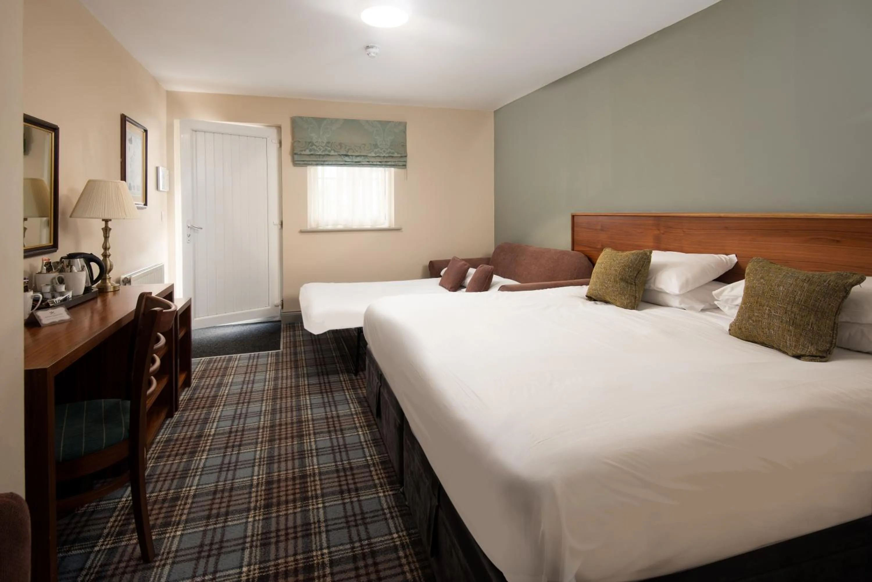 Bed in The Lindisfarne Inn - The Inn Collection Group