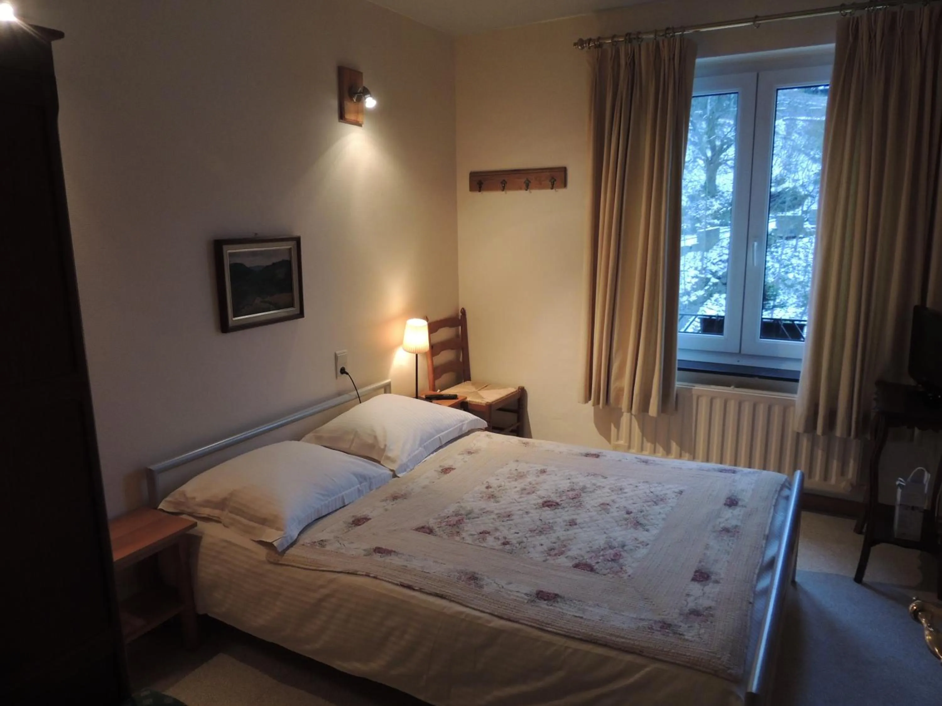 Bed in Hotel Beau Rivage and Restaurant Koulic