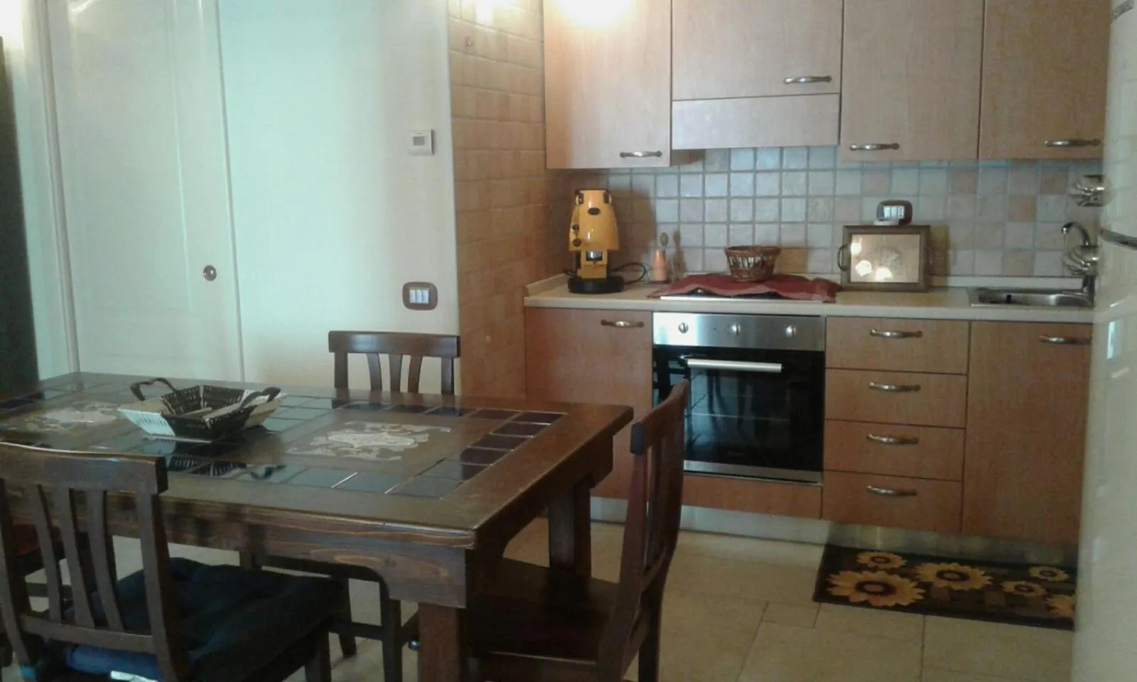 Communal lounge/ TV room in Portico dei Sassi