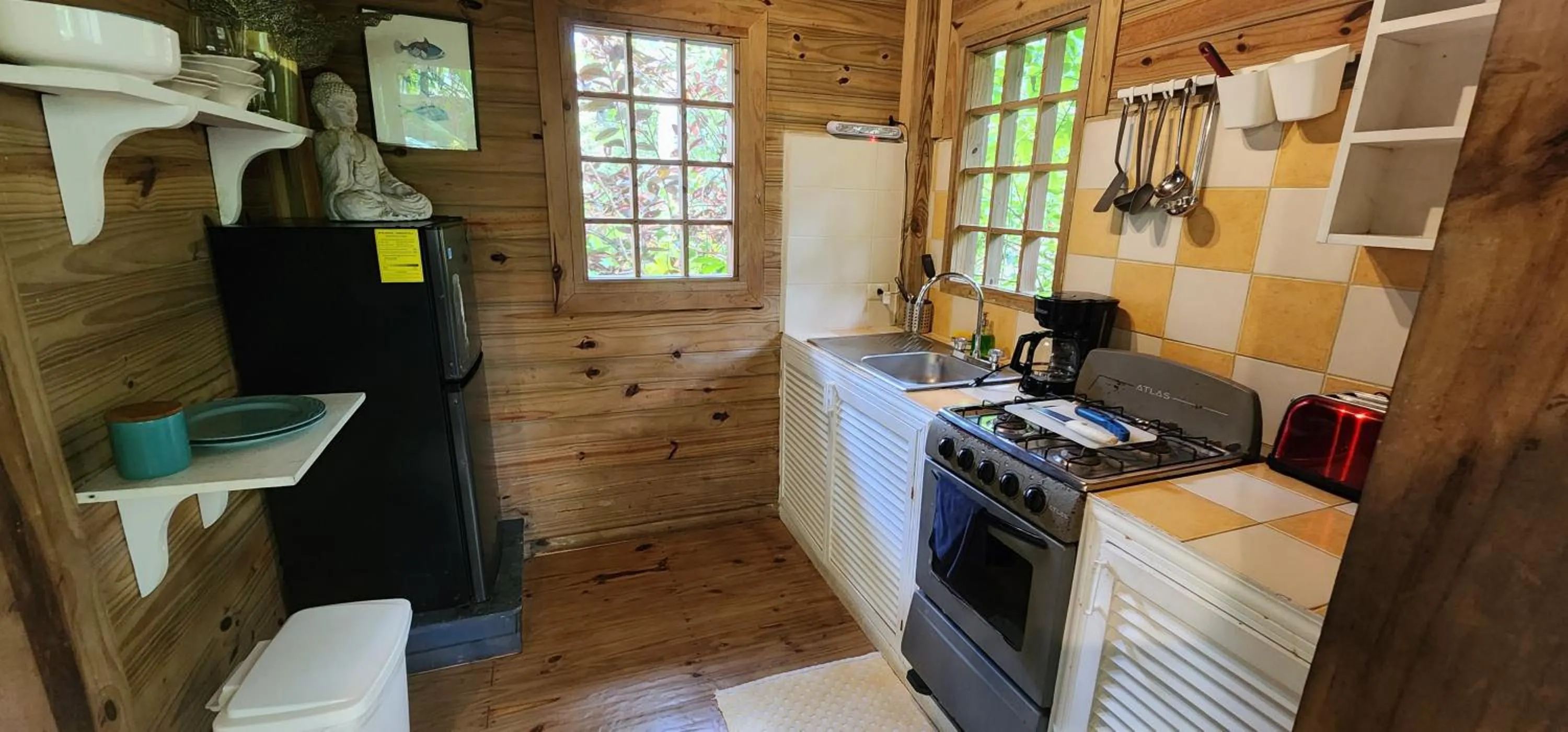 Kitchen or kitchenette in Boutique Hotel y Spa Tangara Azul
