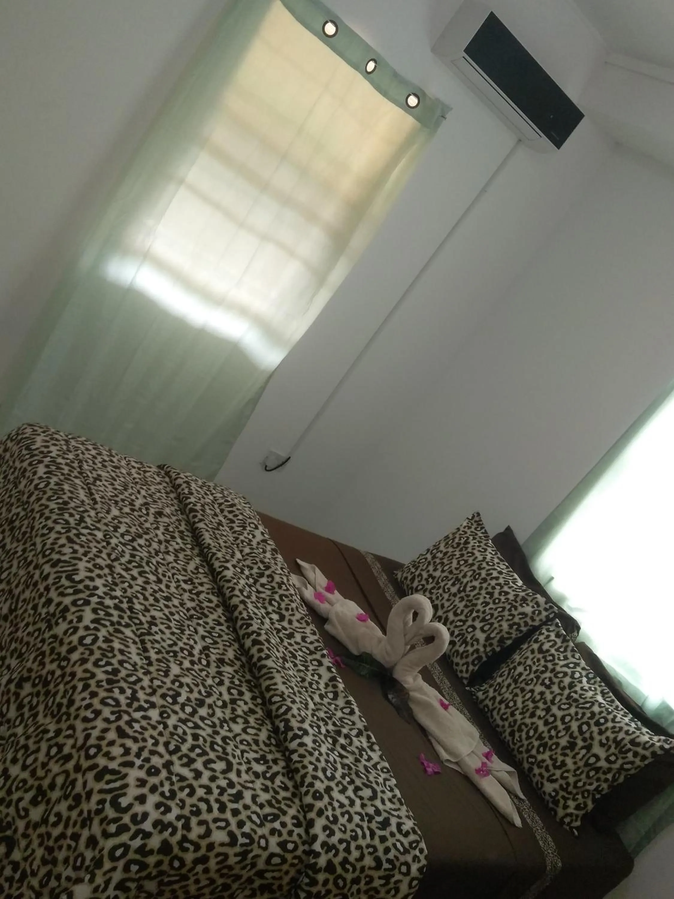 Bed in Caribbean Dream Vacation Property CD1