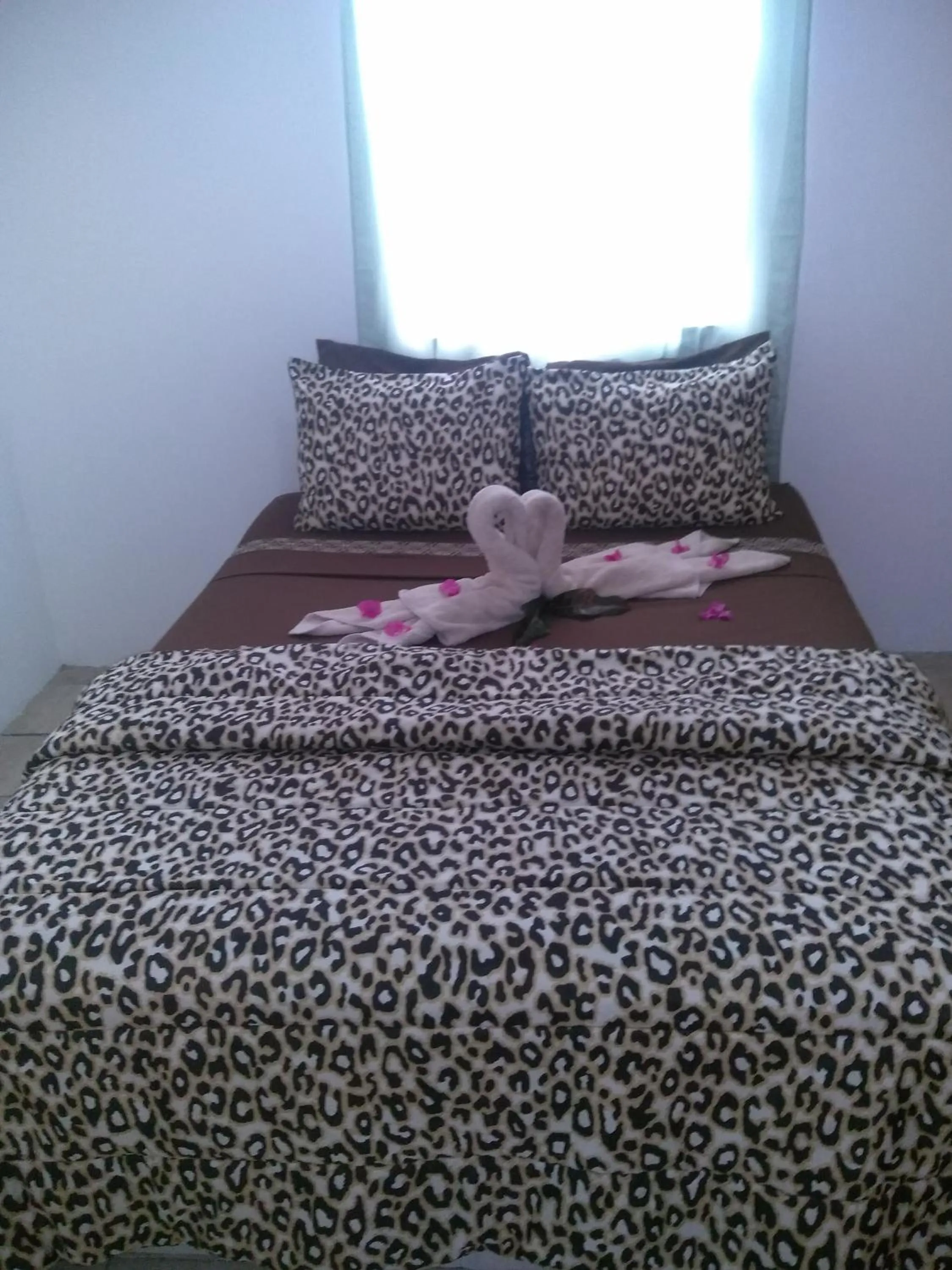 Bed in Caribbean Dream Vacation Property CD1