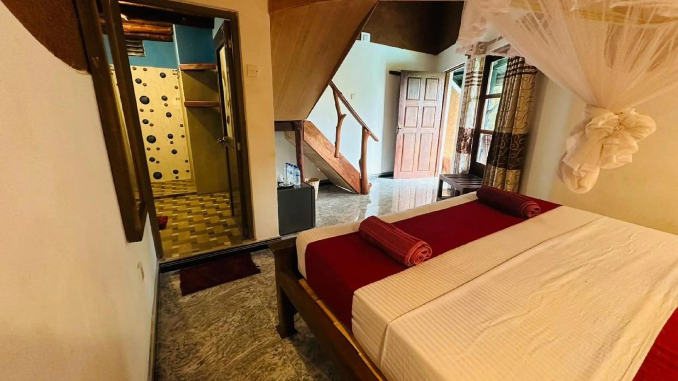 Bed in Sigiri Heritage Villa