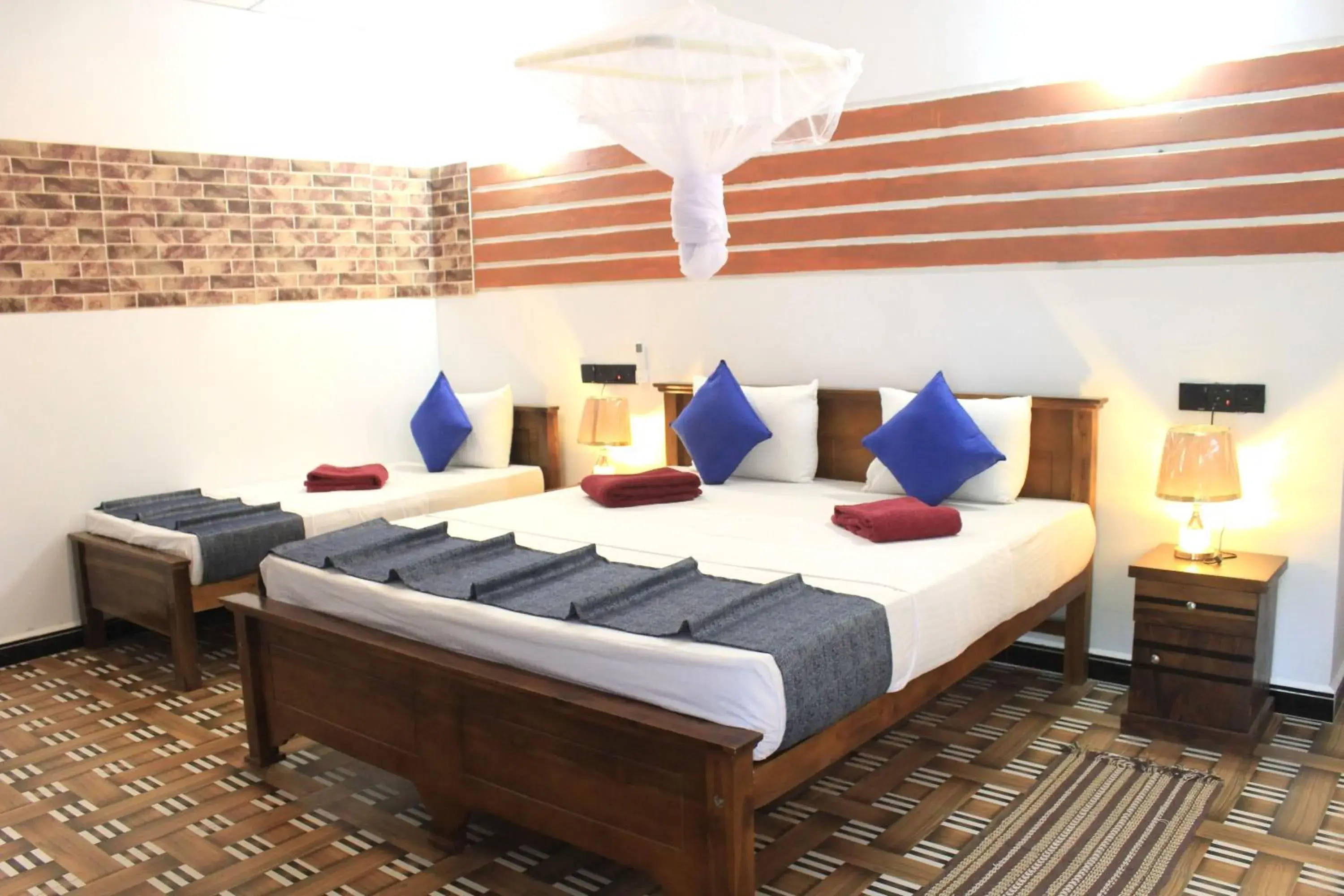 Deluxe Triple Room in Sigiri Heritage Villa Deluxe Triple Room in Sigiri Heritage Villa