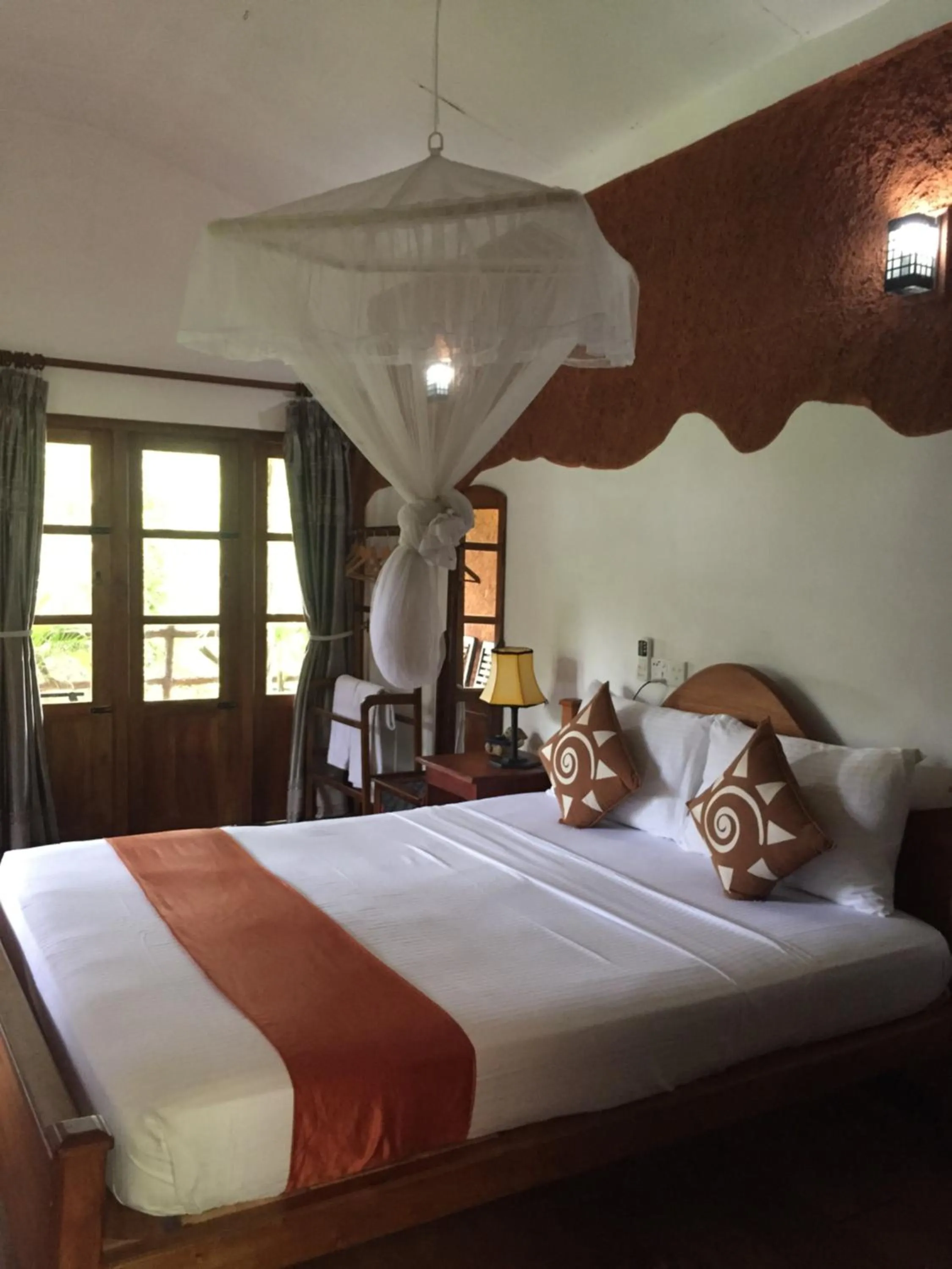 Bed in Sigiri Heritage Villa