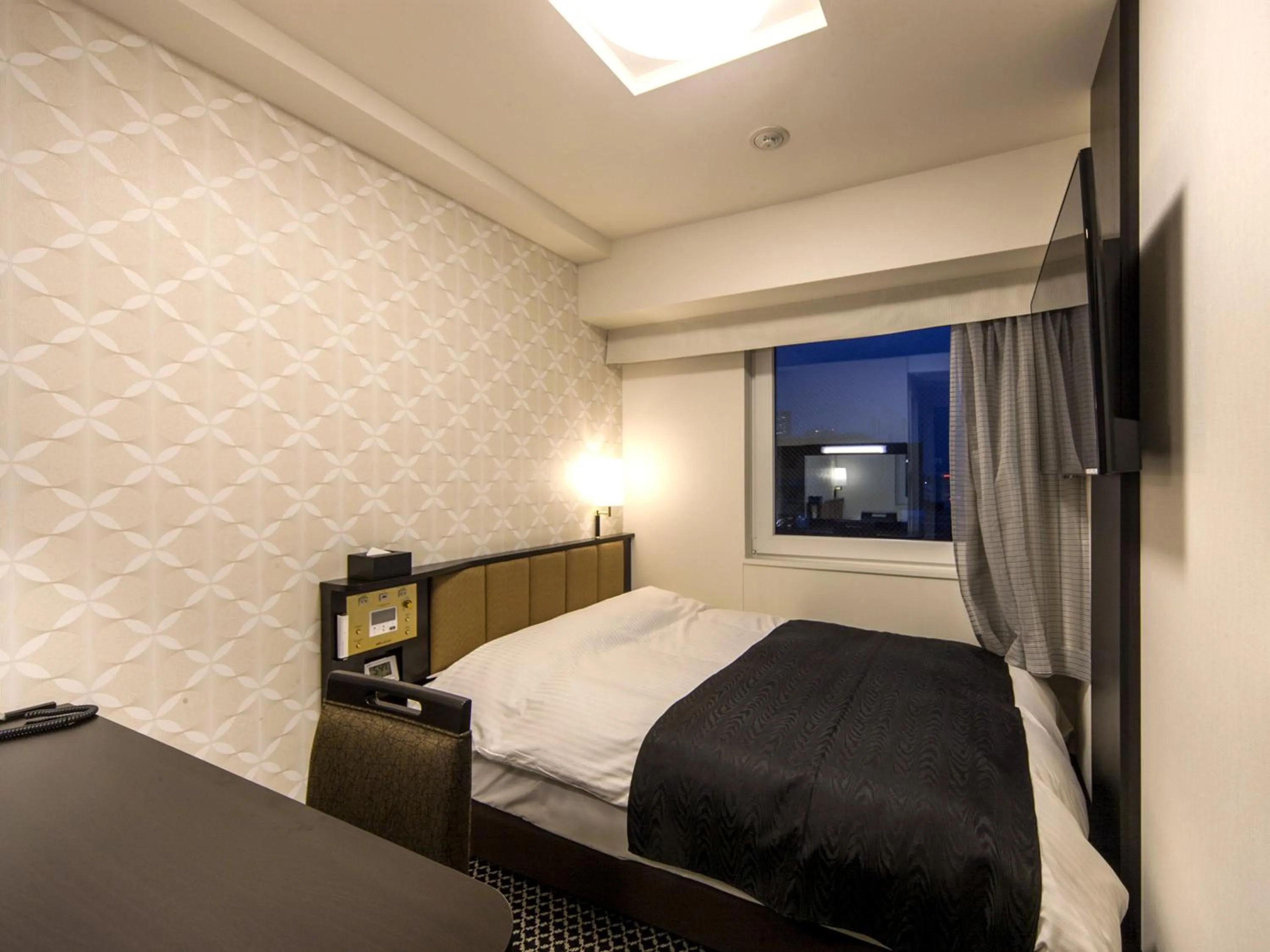 Bed in APA Hotel Higashi Shinjuku Kabukicho Higashi