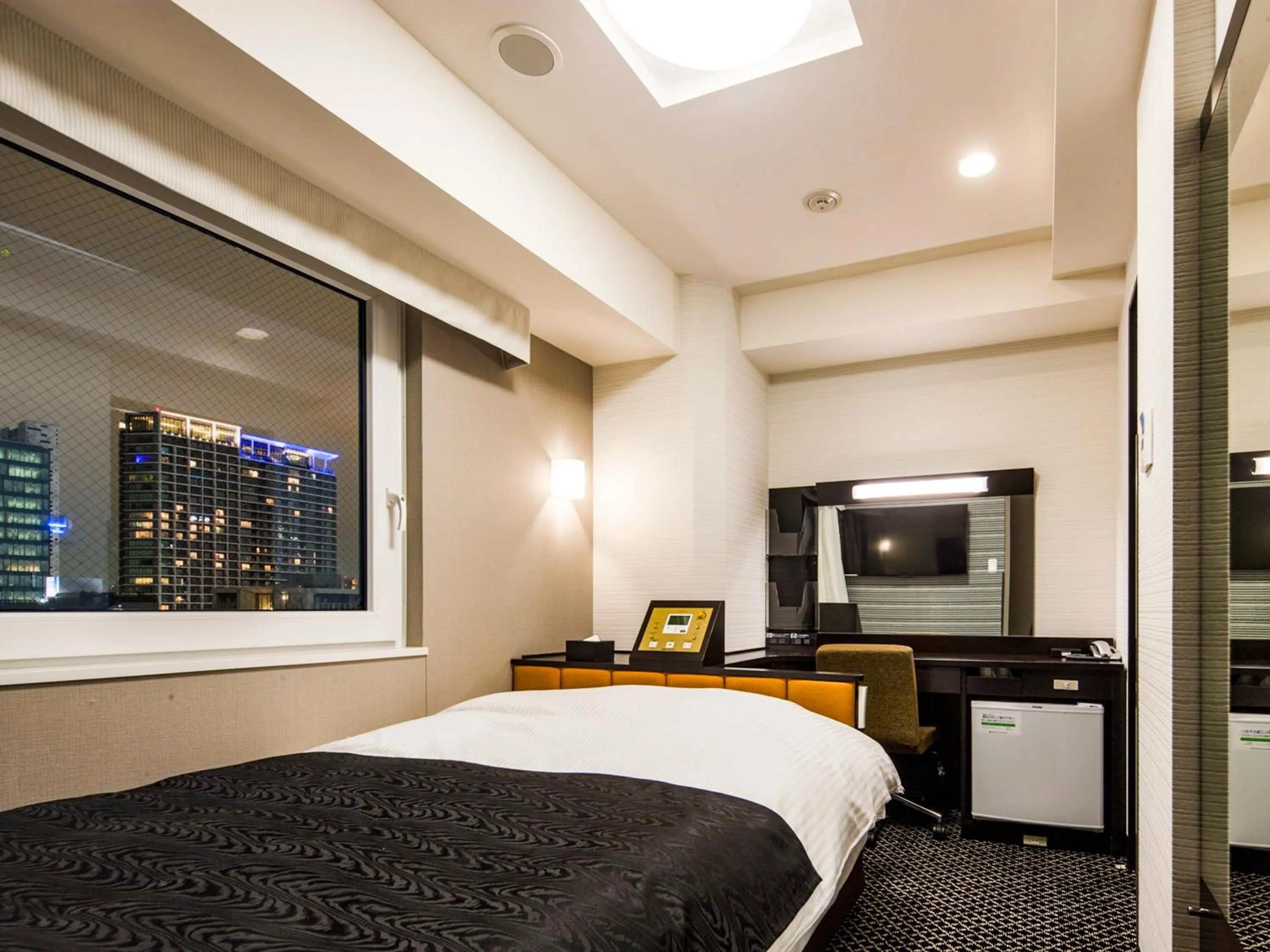 Bed in APA Hotel Higashi Shinjuku Kabukicho Higashi