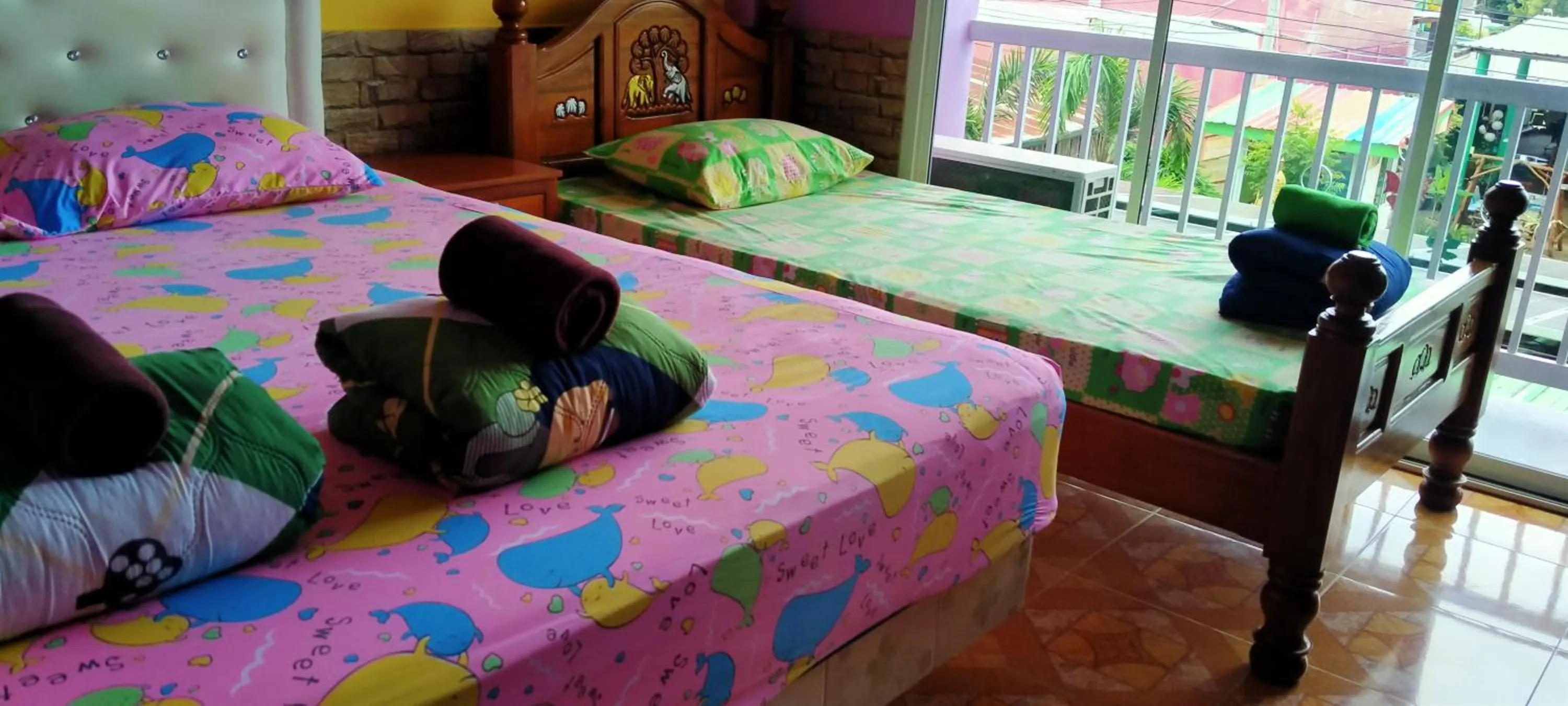 Bed in Rueangsrisiri Guesthouse 2