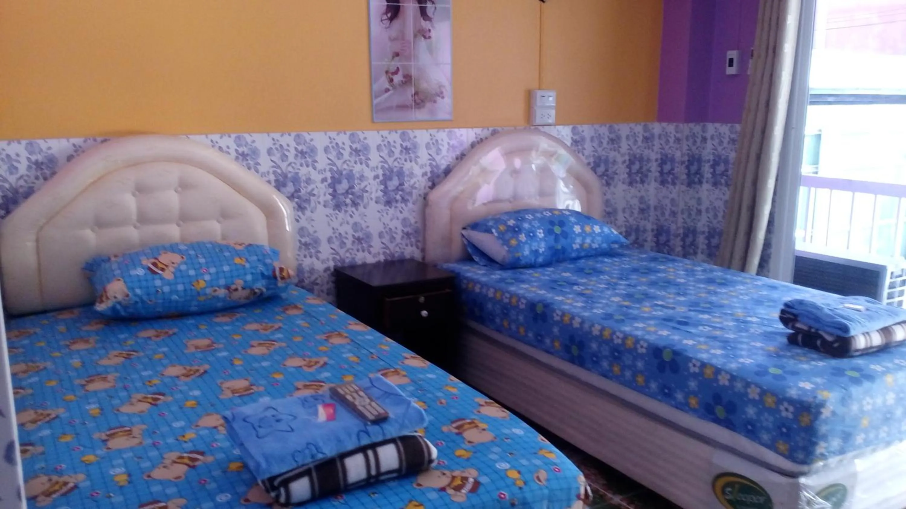 Photo of the whole room, Bed in Rueangsrisiri Guesthouse 2