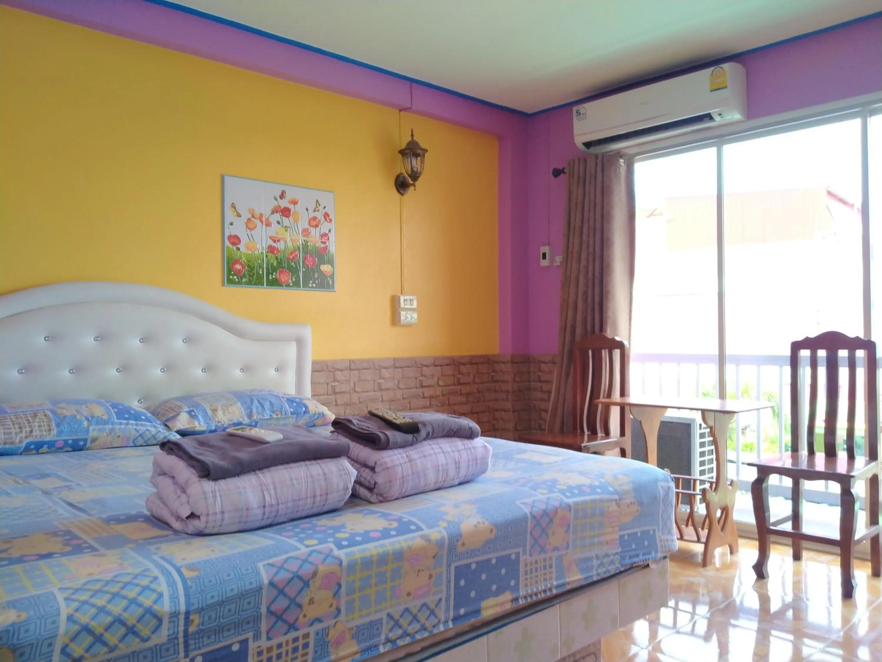 Bed in Rueangsrisiri Guesthouse 2