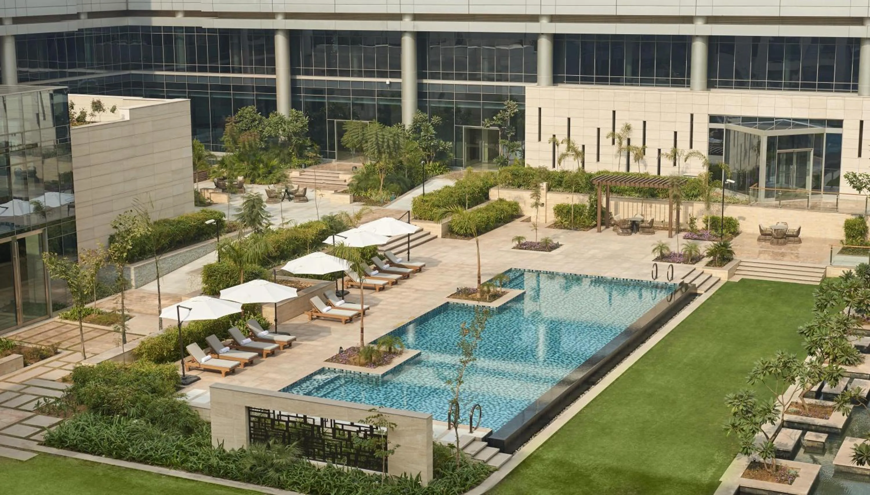 Swimming pool in Andaz Delhi, by Hyatt
