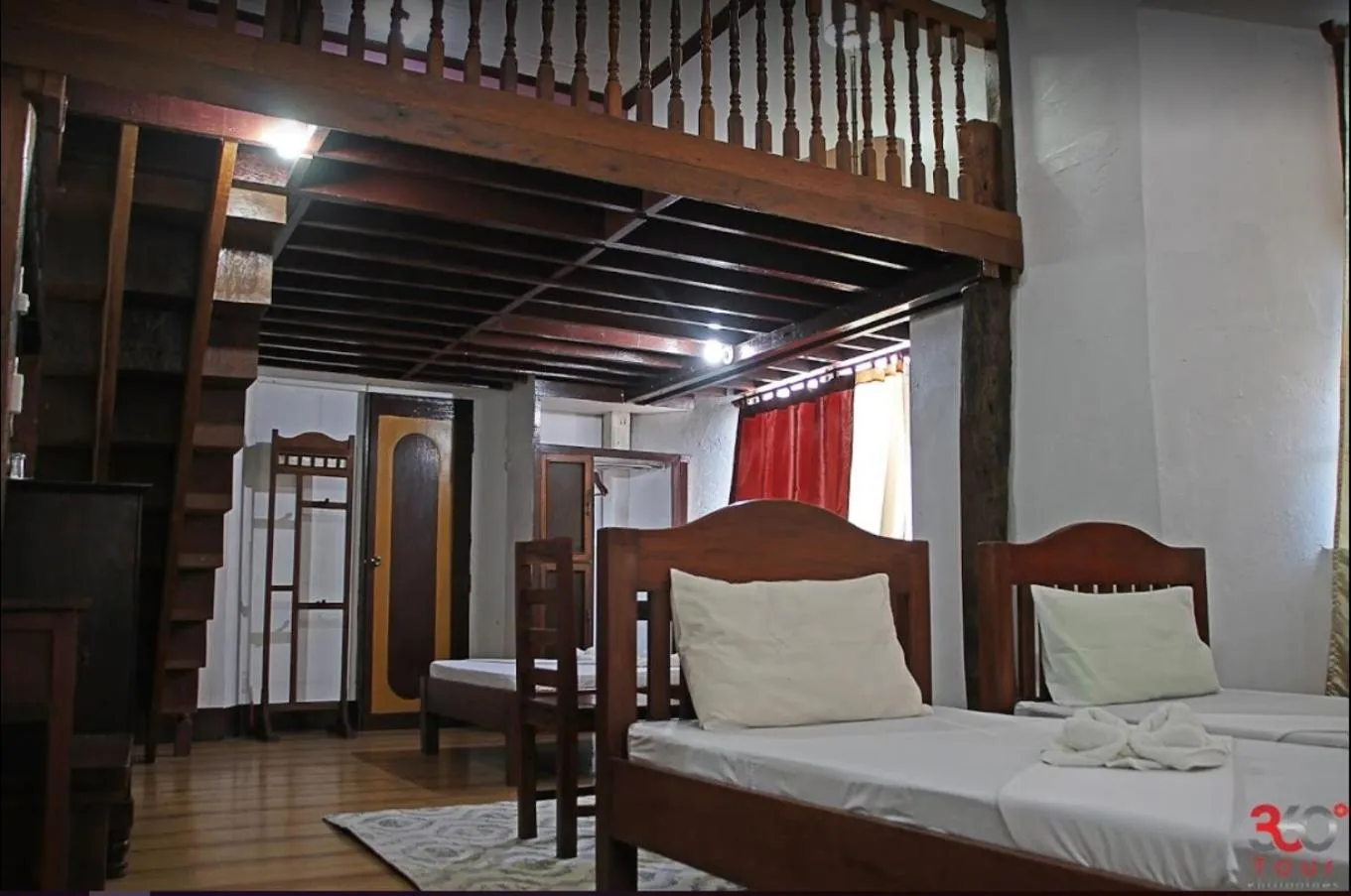 Bed in Escolta's Homey Lodge