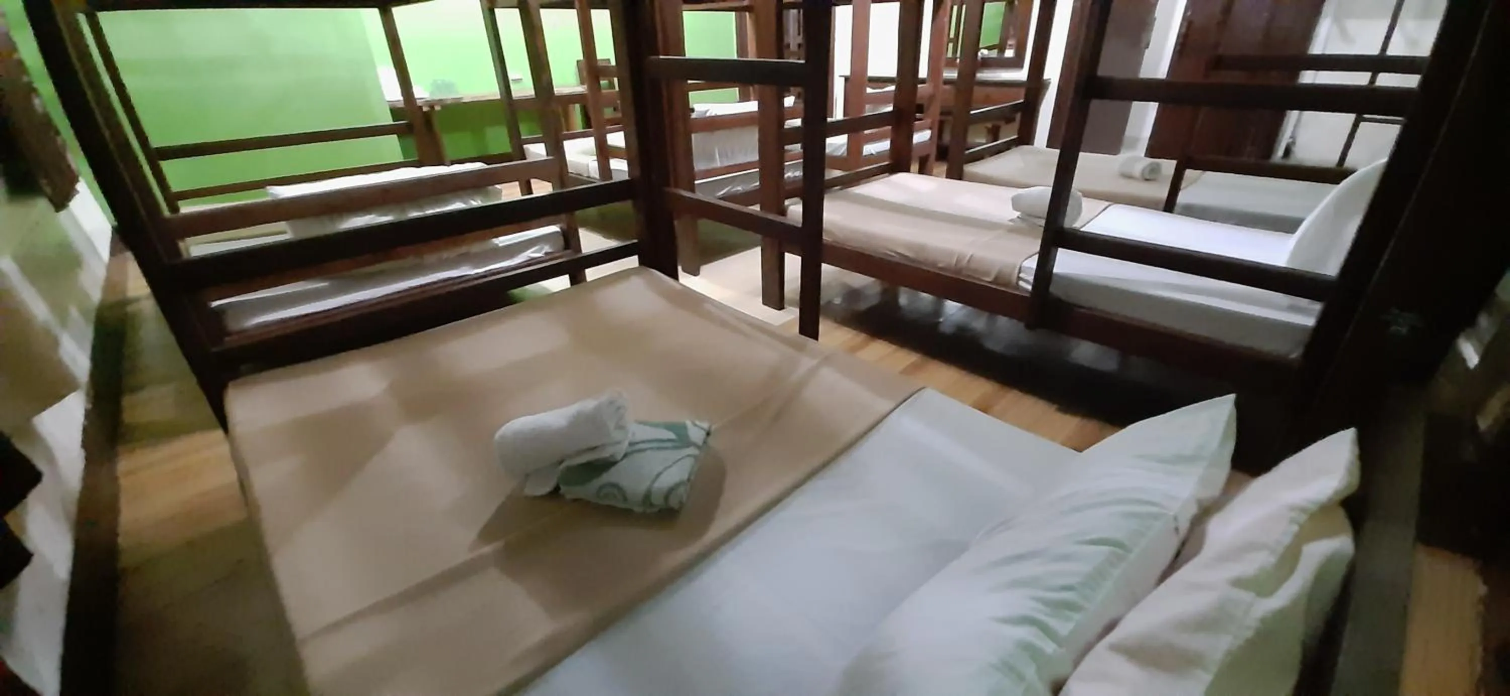 Bed in Escolta's Homey Lodge