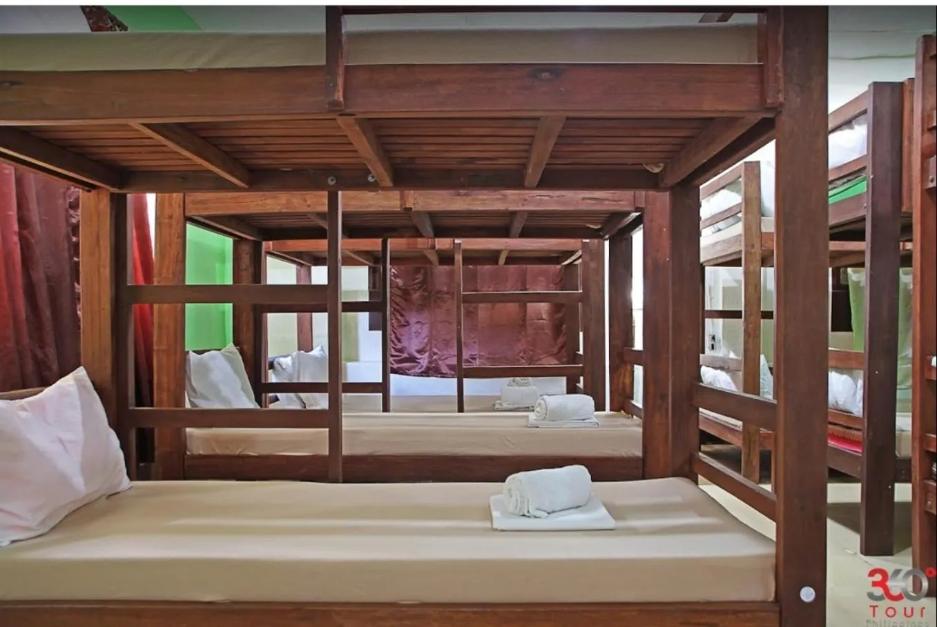 Bed in Escolta's Homey Lodge