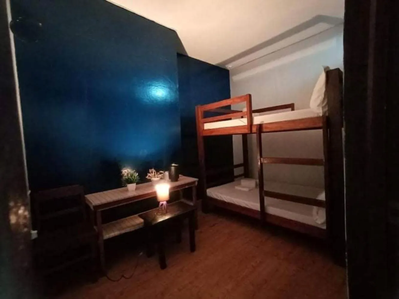 Bed in Escolta's Homey Lodge