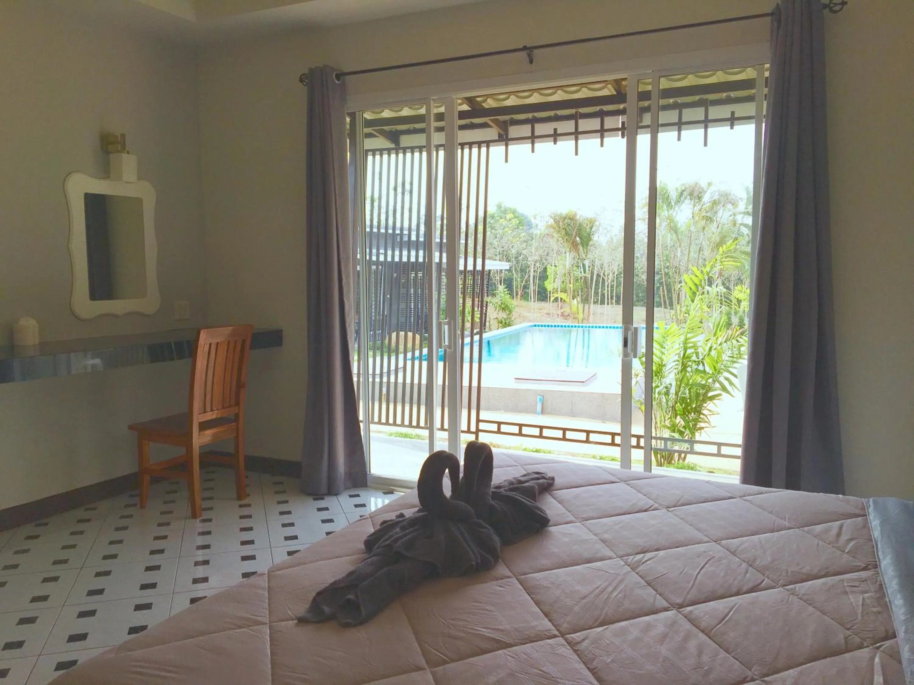 Photo of the whole room, Bed in The Herbal Khao Lak
