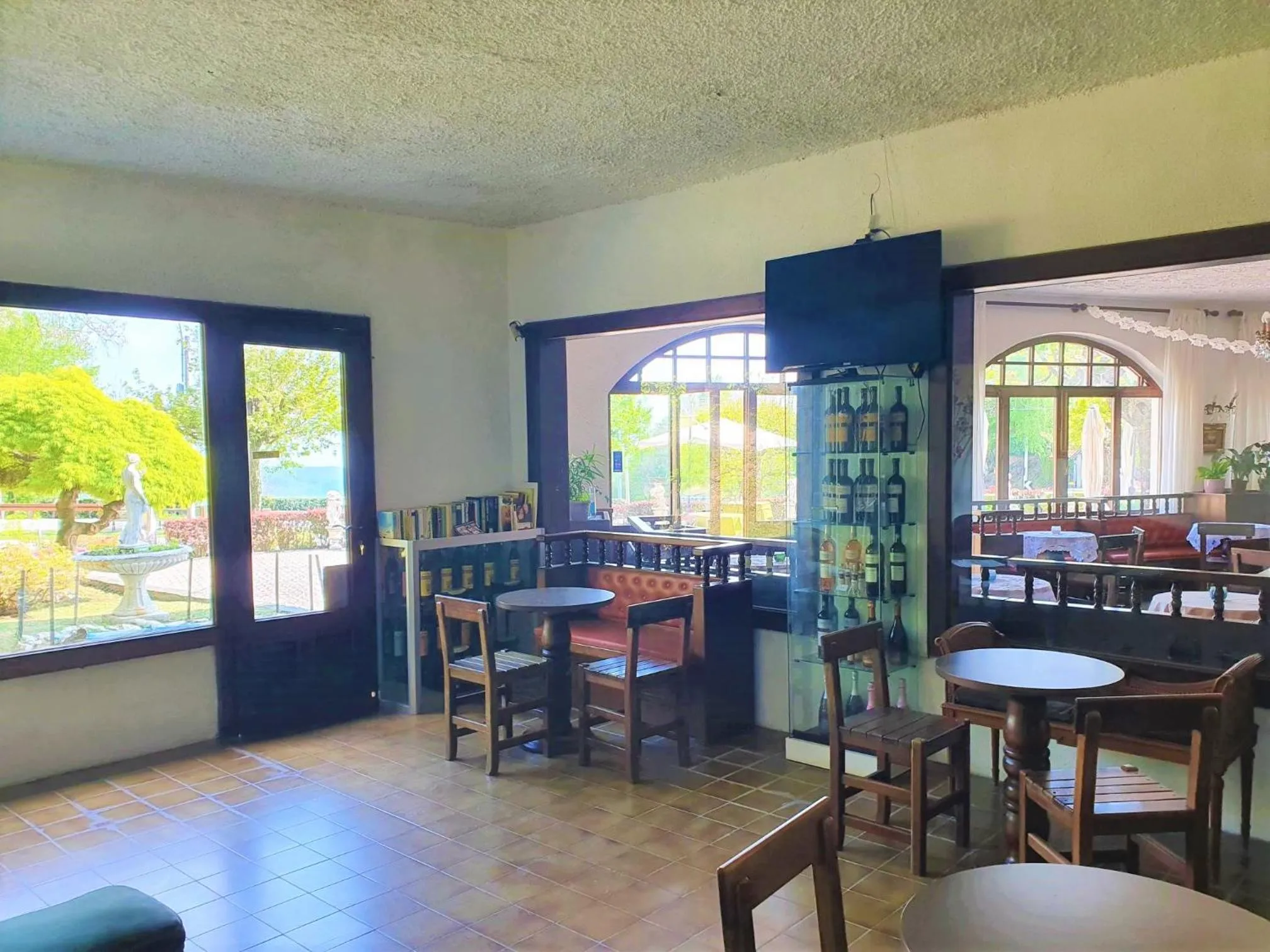 Communal lounge/ TV room in Hotel Madonna di Luciago