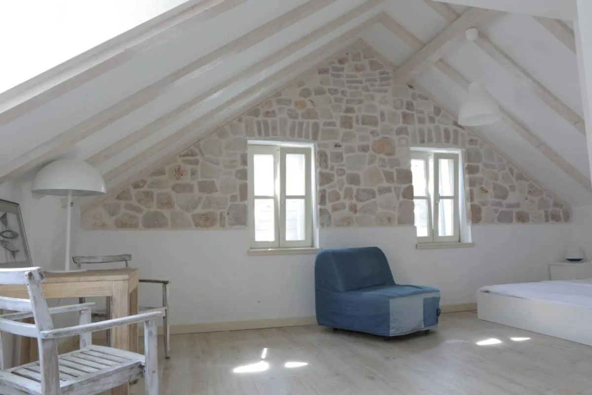 Living room, Bed in Hotel Maestral