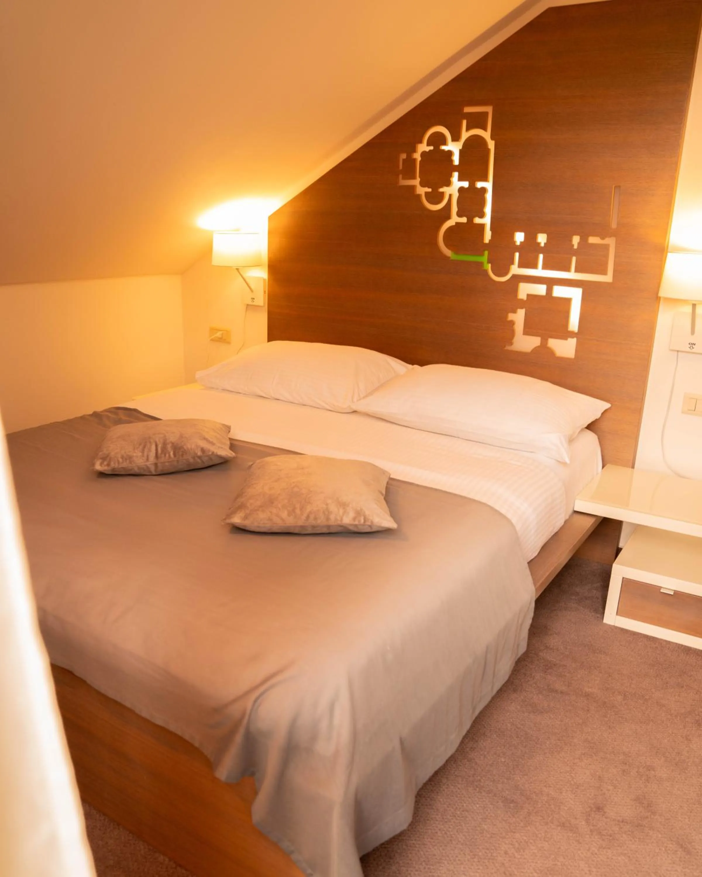 Bed in Slavija Culture Heritage Hotel