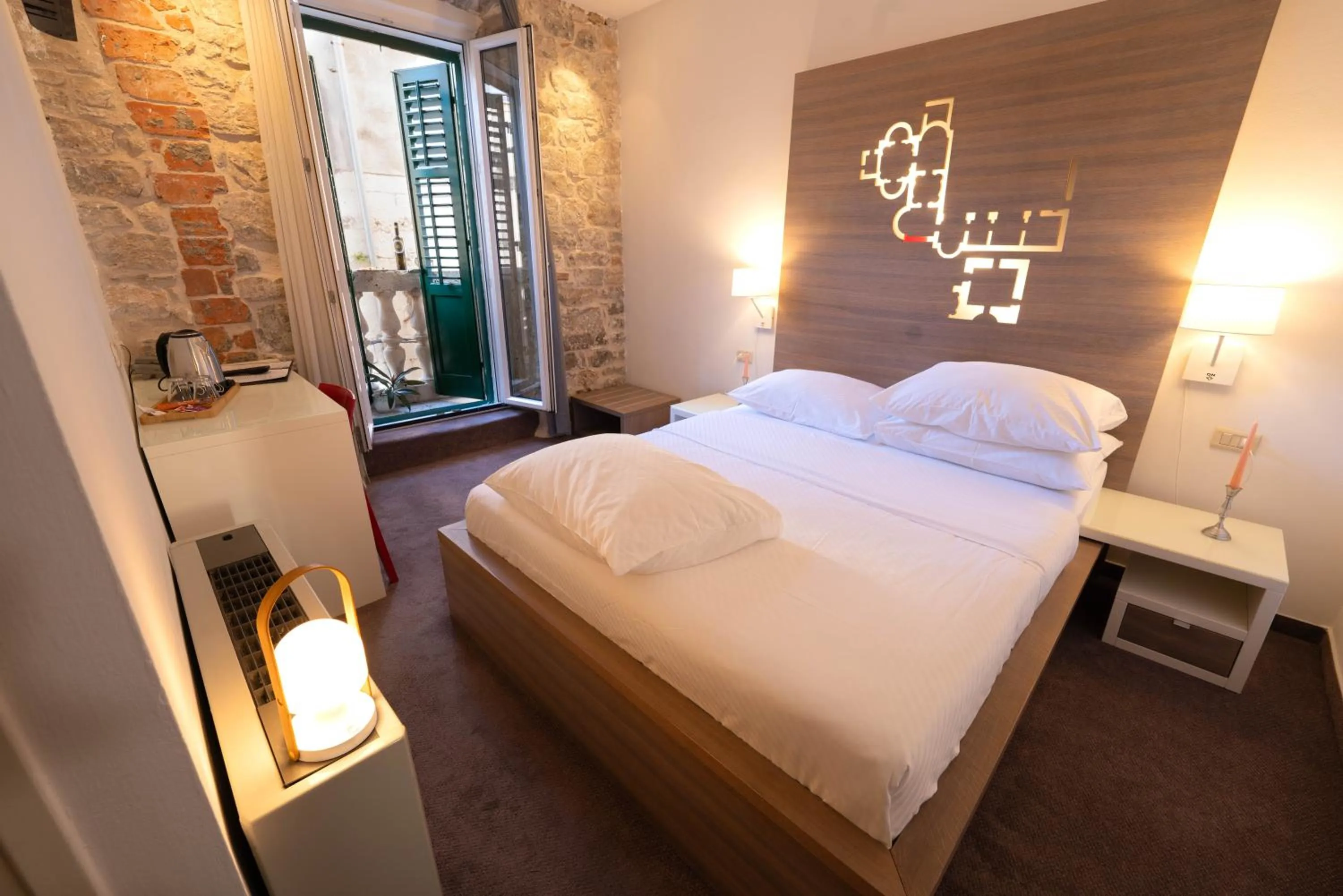 Bed in Slavija Culture Heritage Hotel