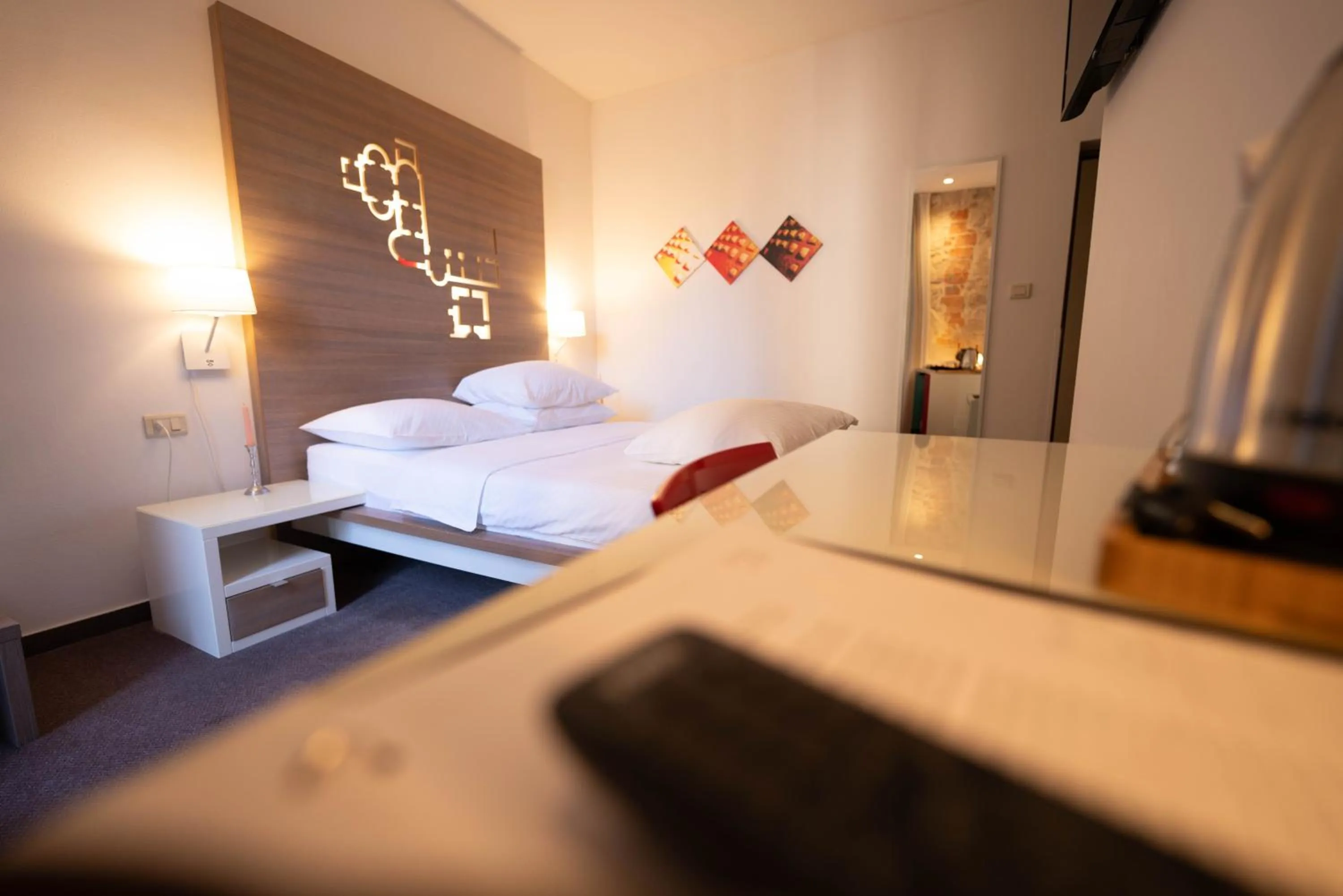 Bed in Slavija Culture Heritage Hotel