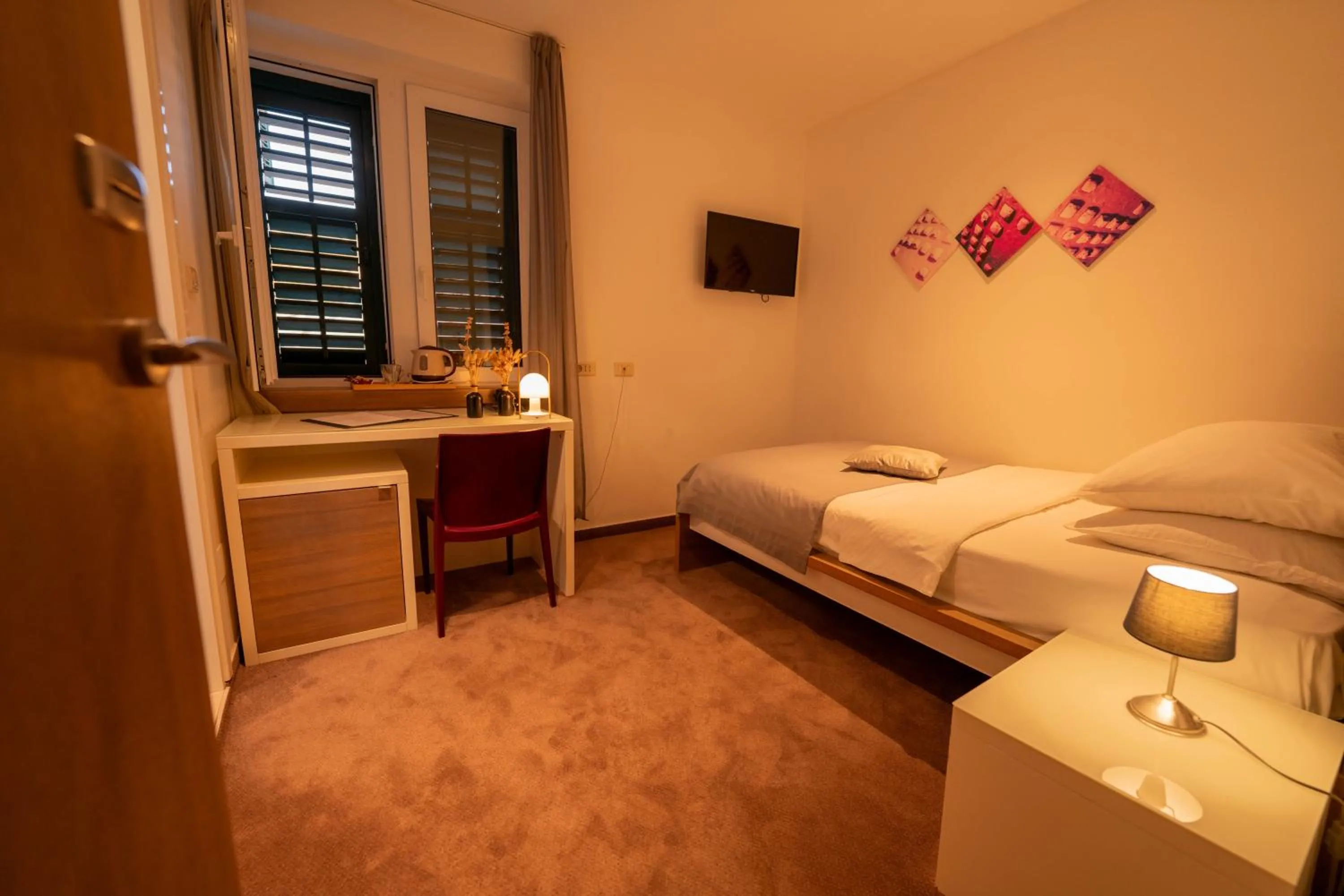 Bed in Slavija Culture Heritage Hotel