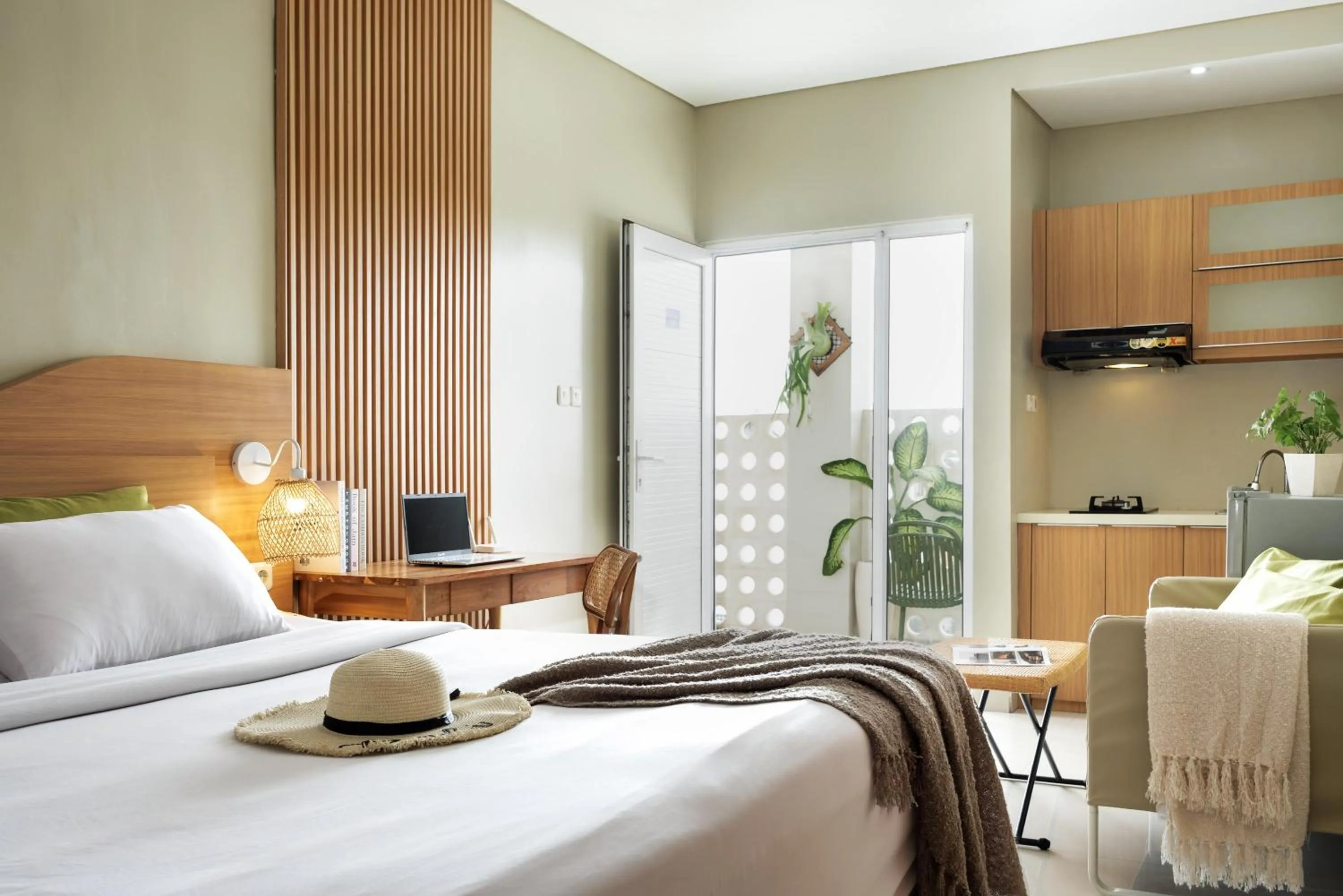 Bed in Deva Bali Apartement