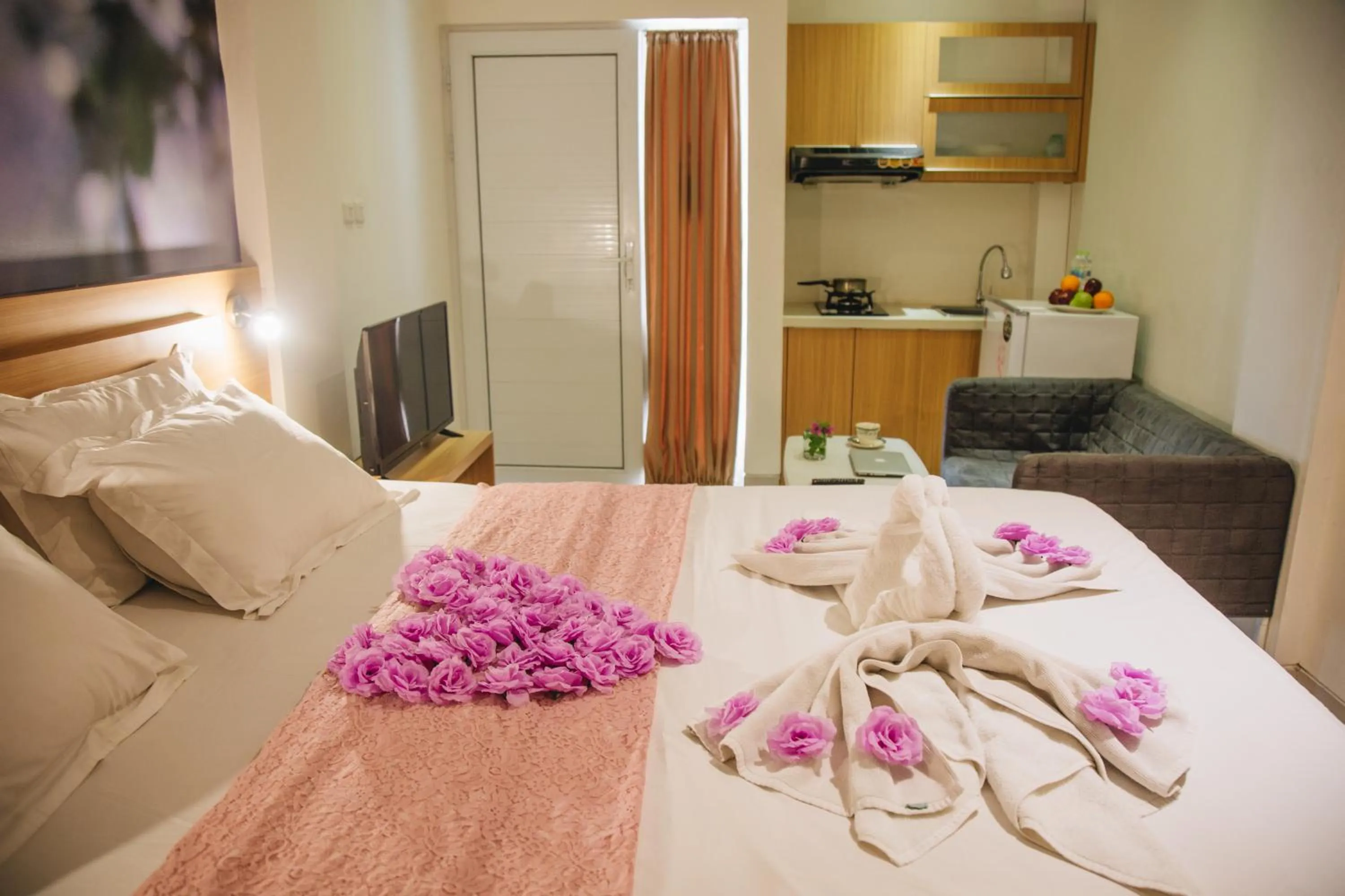 Bed in Deva Bali Apartement