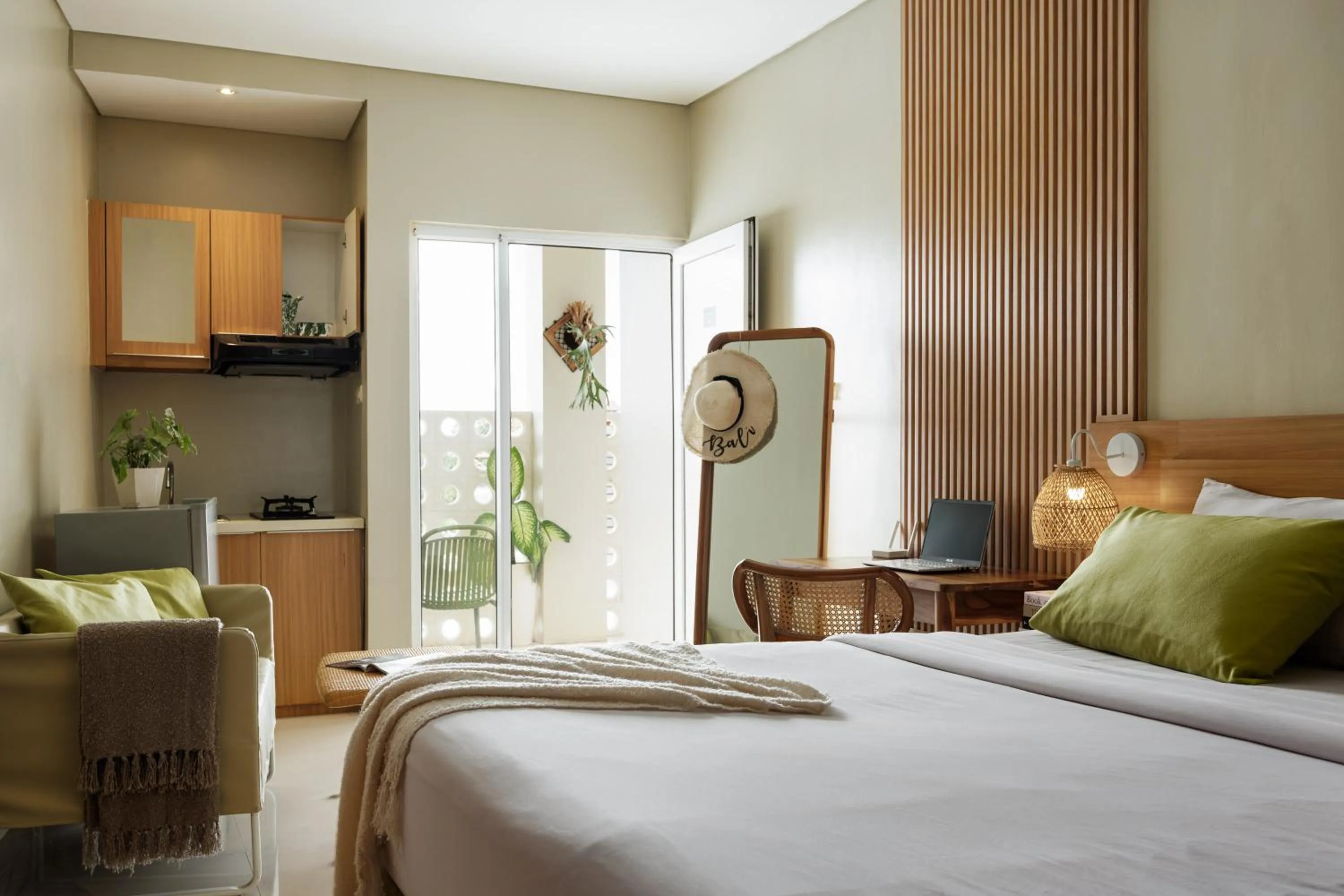 Bed in Deva Bali Apartement