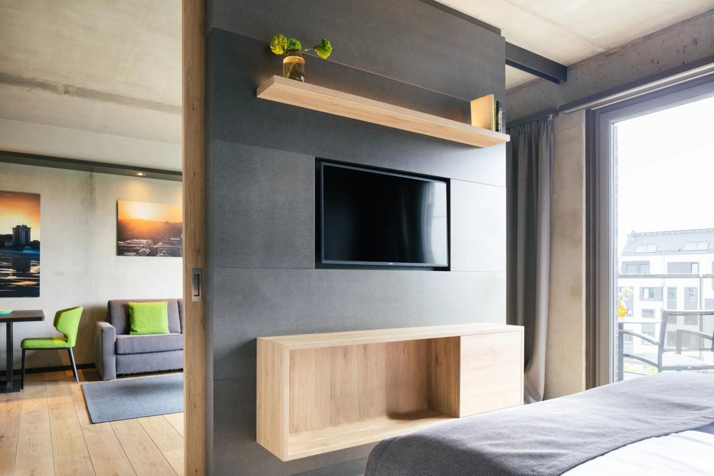 TV and multimedia, Bed in Downtown Apartments Mitte
