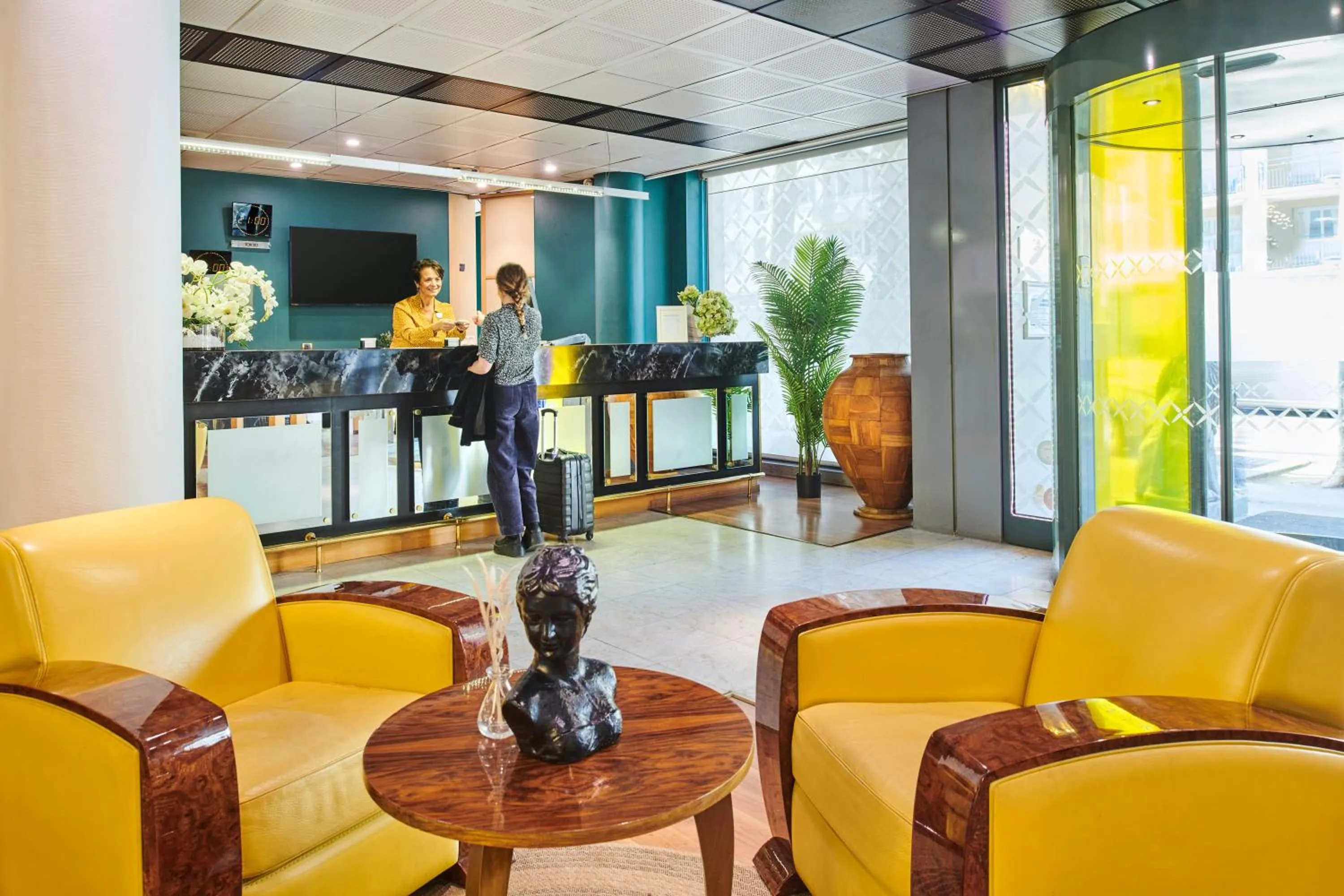 Lobby or reception in Hôtel Charlemagne by Happyculture