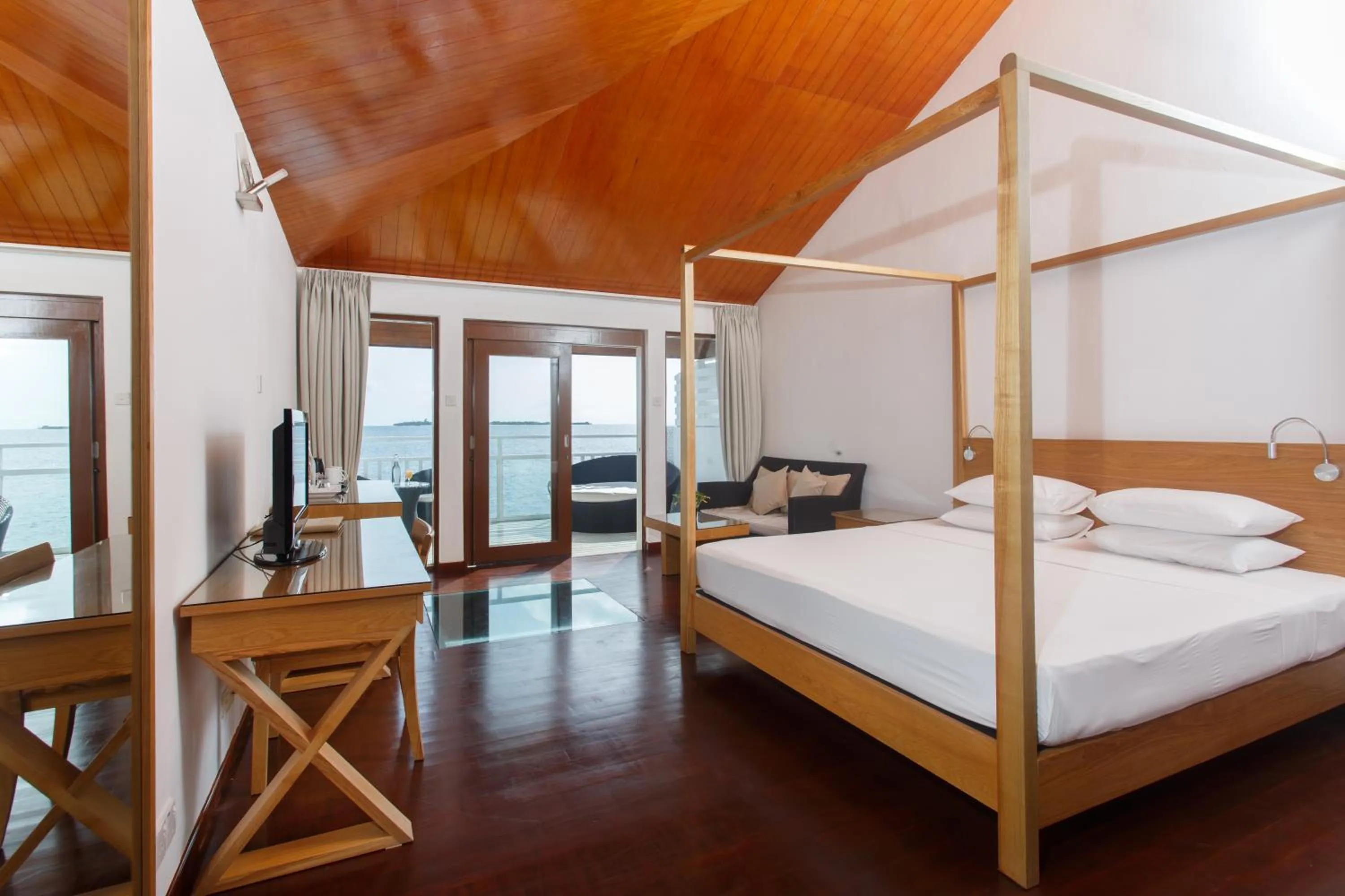 Photo of the whole room, Bed in Embudu Village Maldives