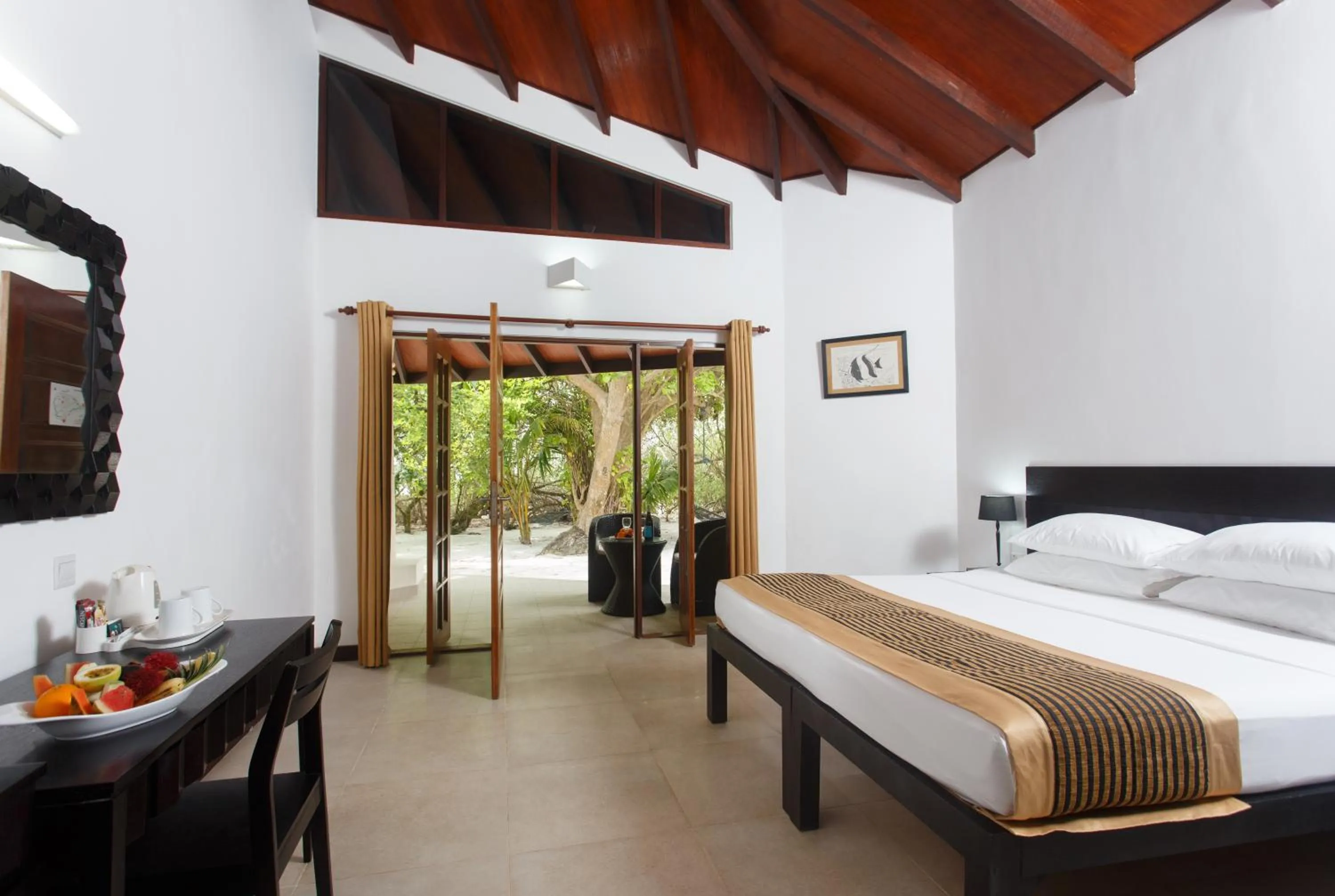 Photo of the whole room, Bed in Embudu Village Maldives