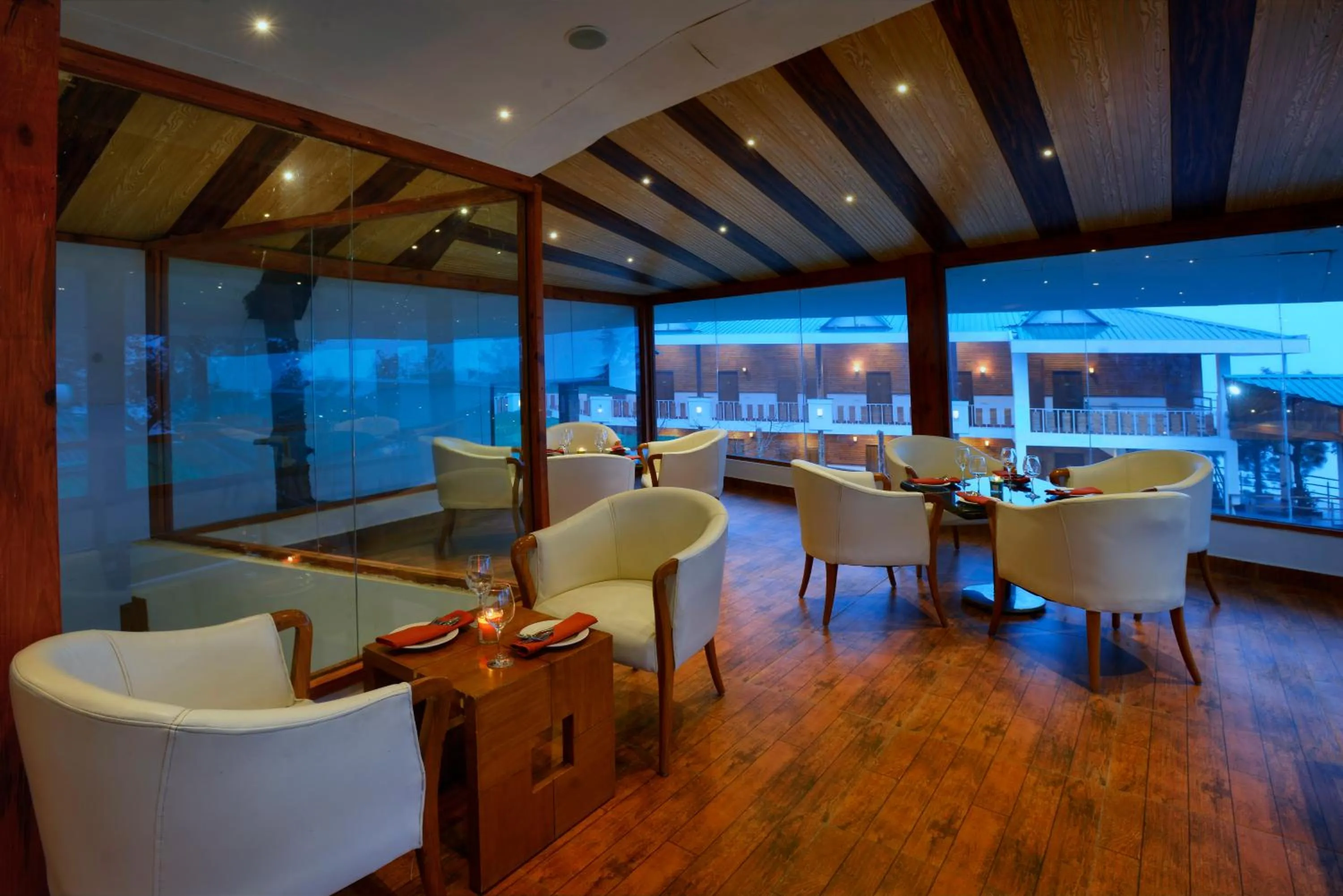 Seating area in TreeHouse Chail Villas