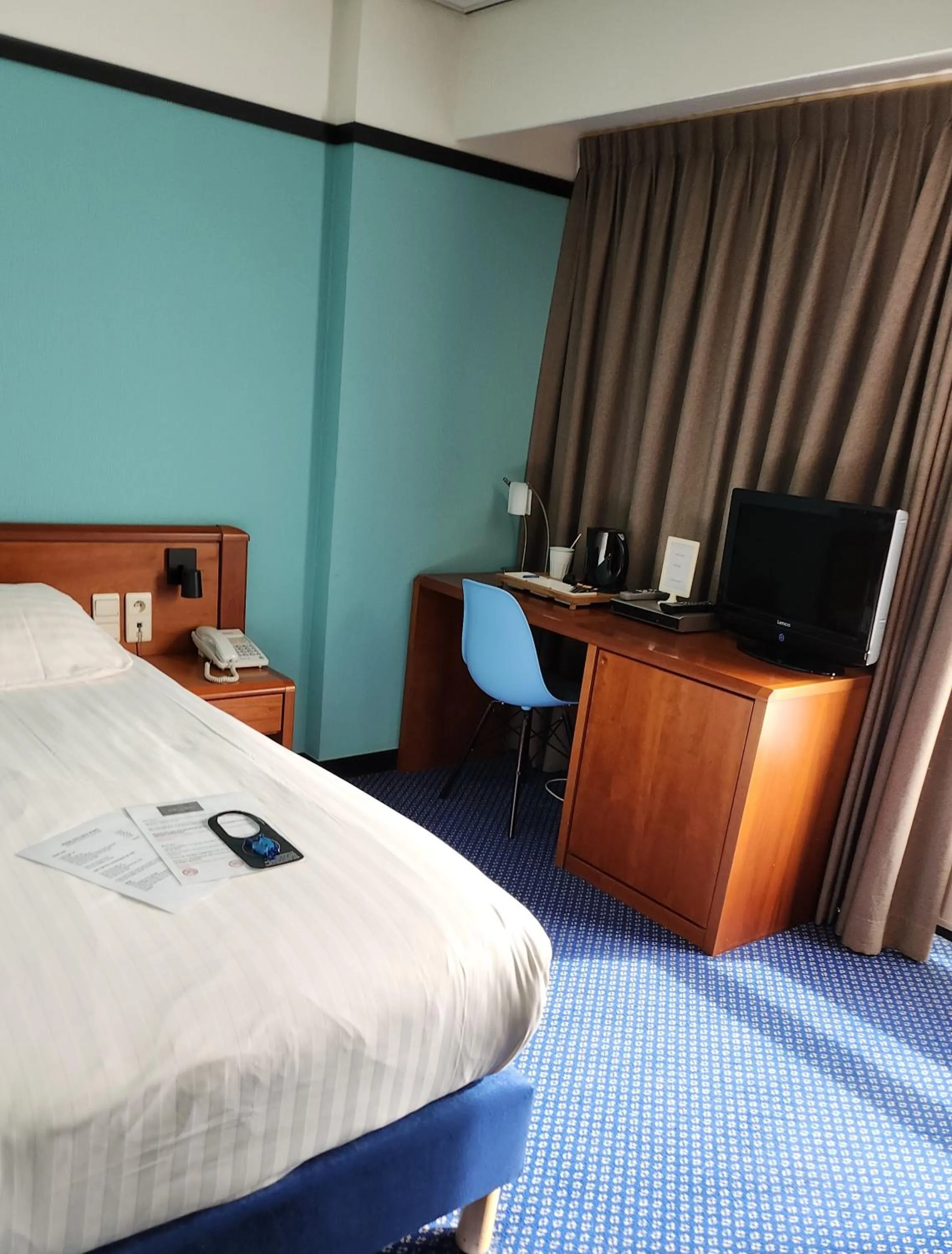 Bed in Hotel Royal Zelzate