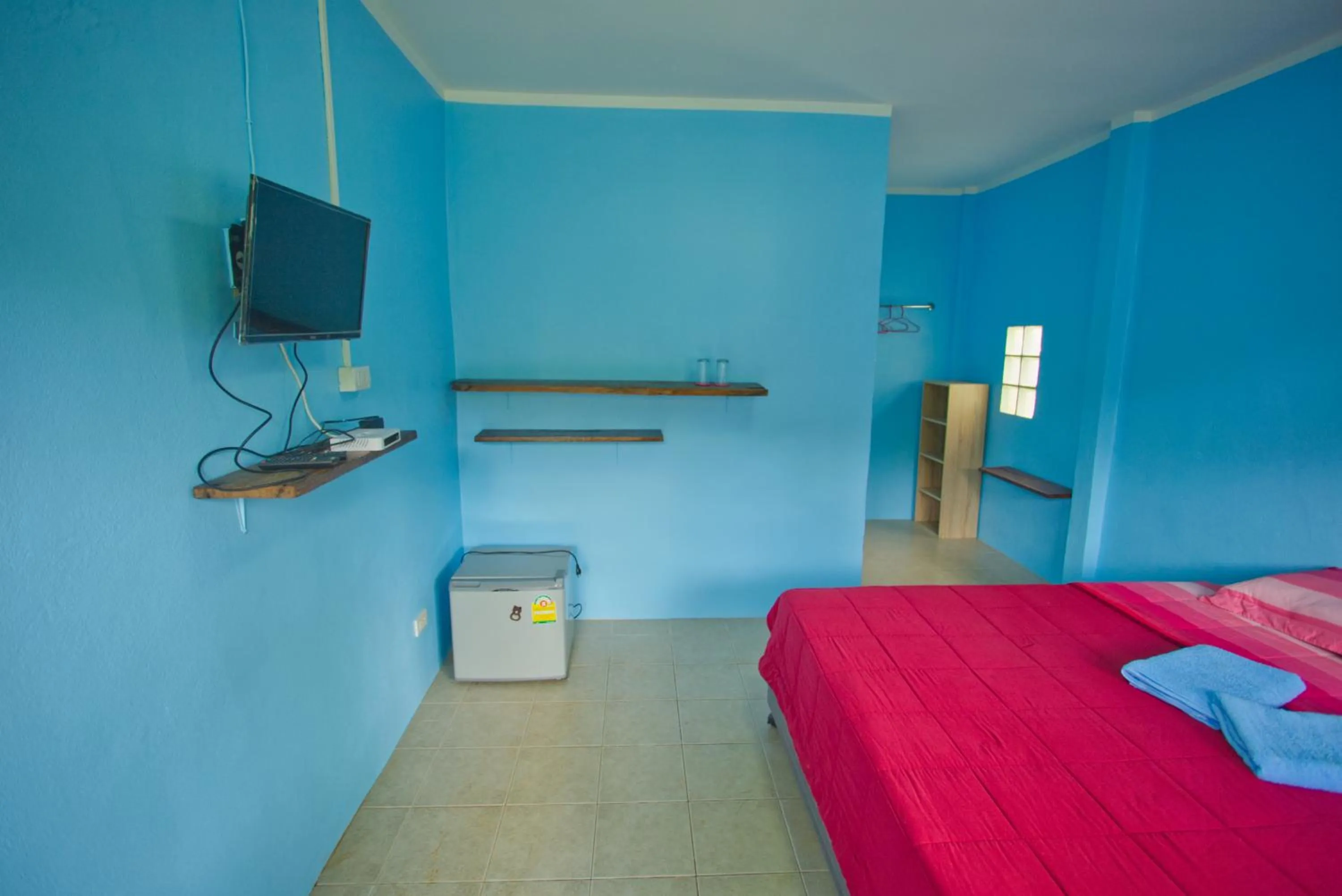 Toilet, Bed in Sea View Resort