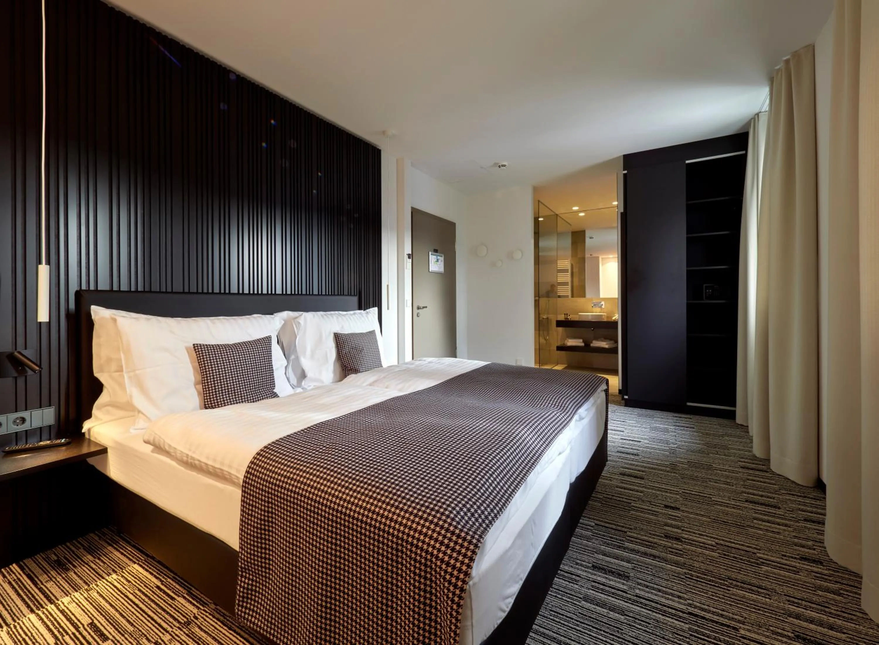 Bed in Hostellerie Stafelter