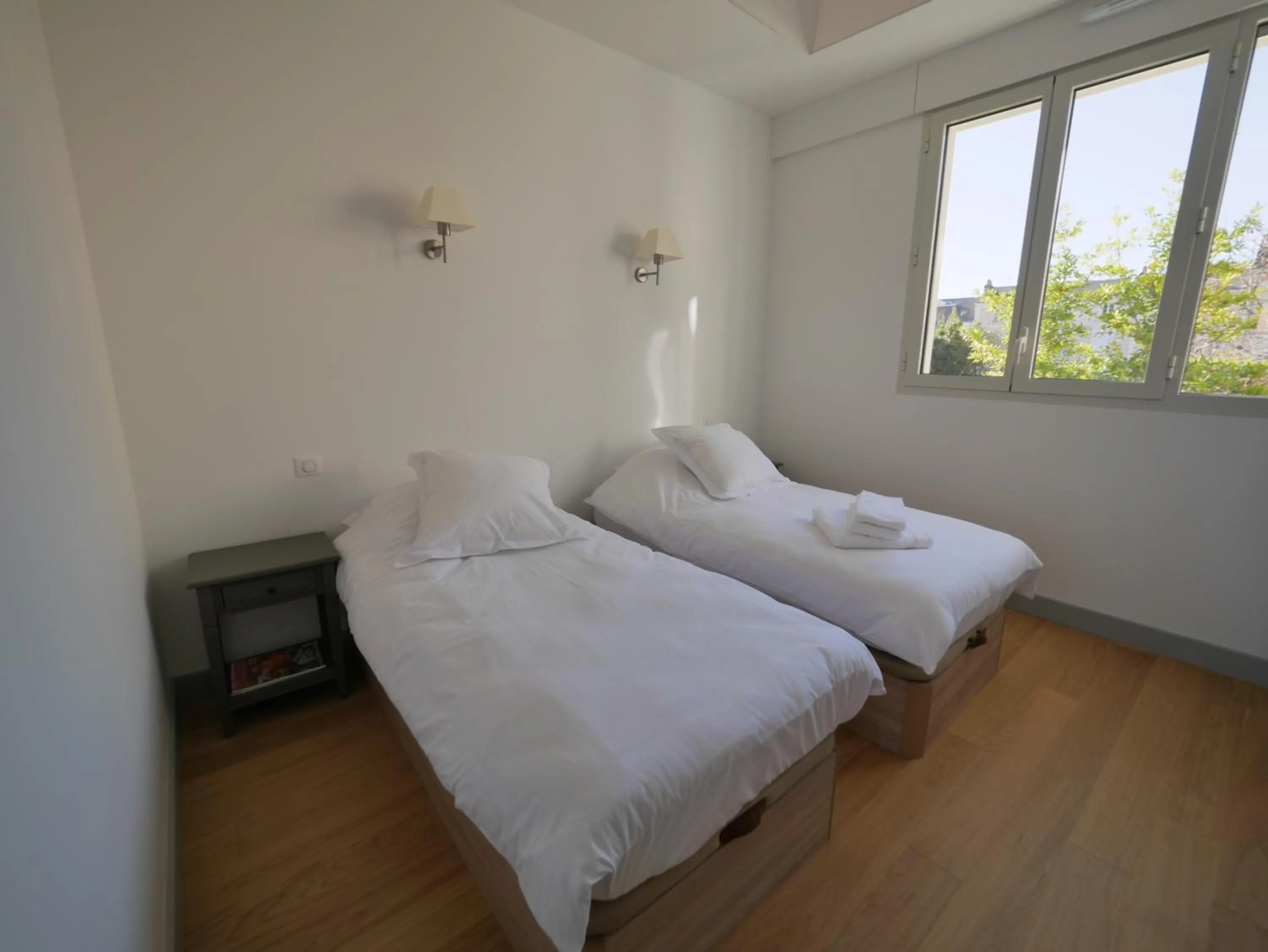 Bedroom in Résidence de Tourisme Central Parc Tours