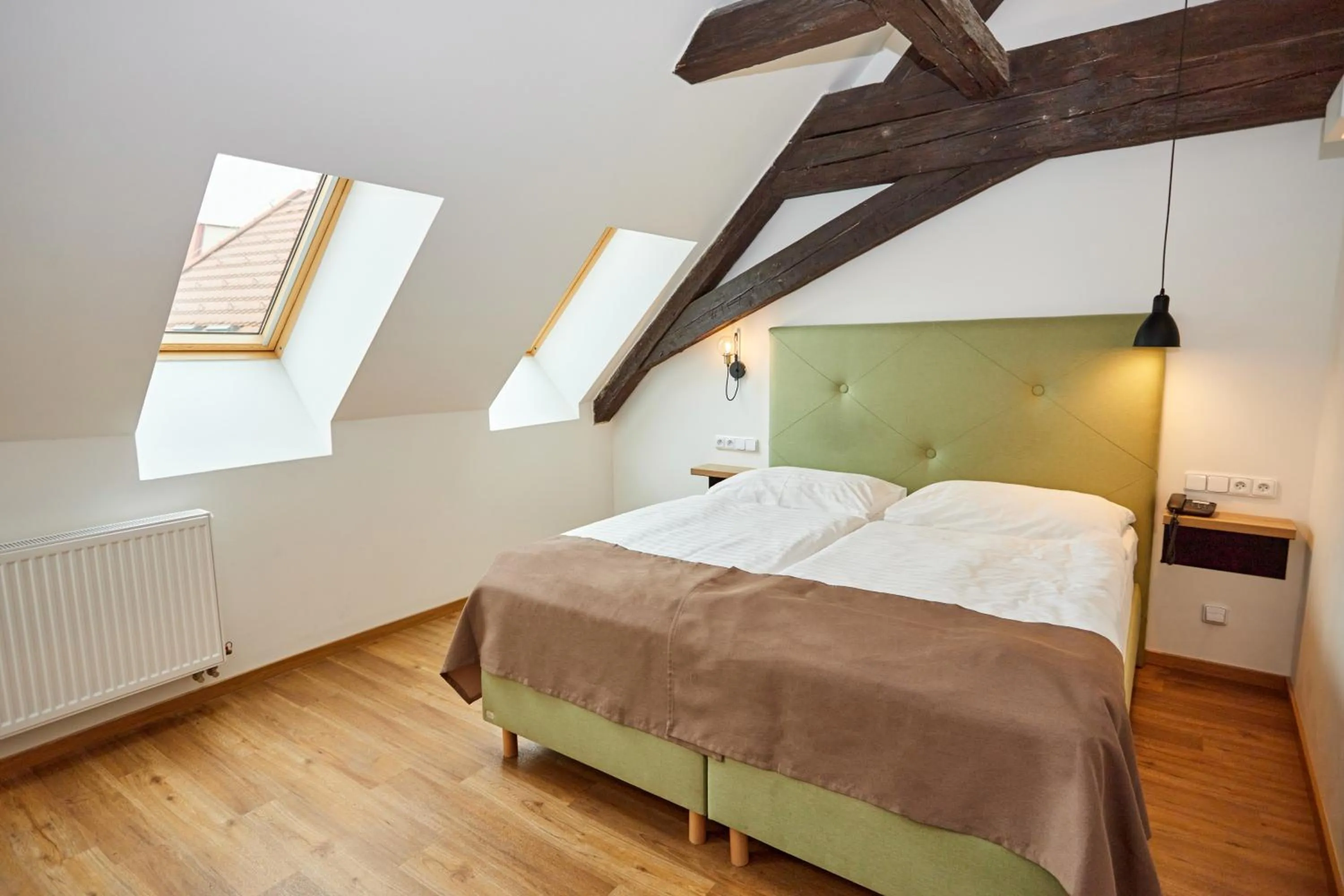 Bed in Hotel Garden Court