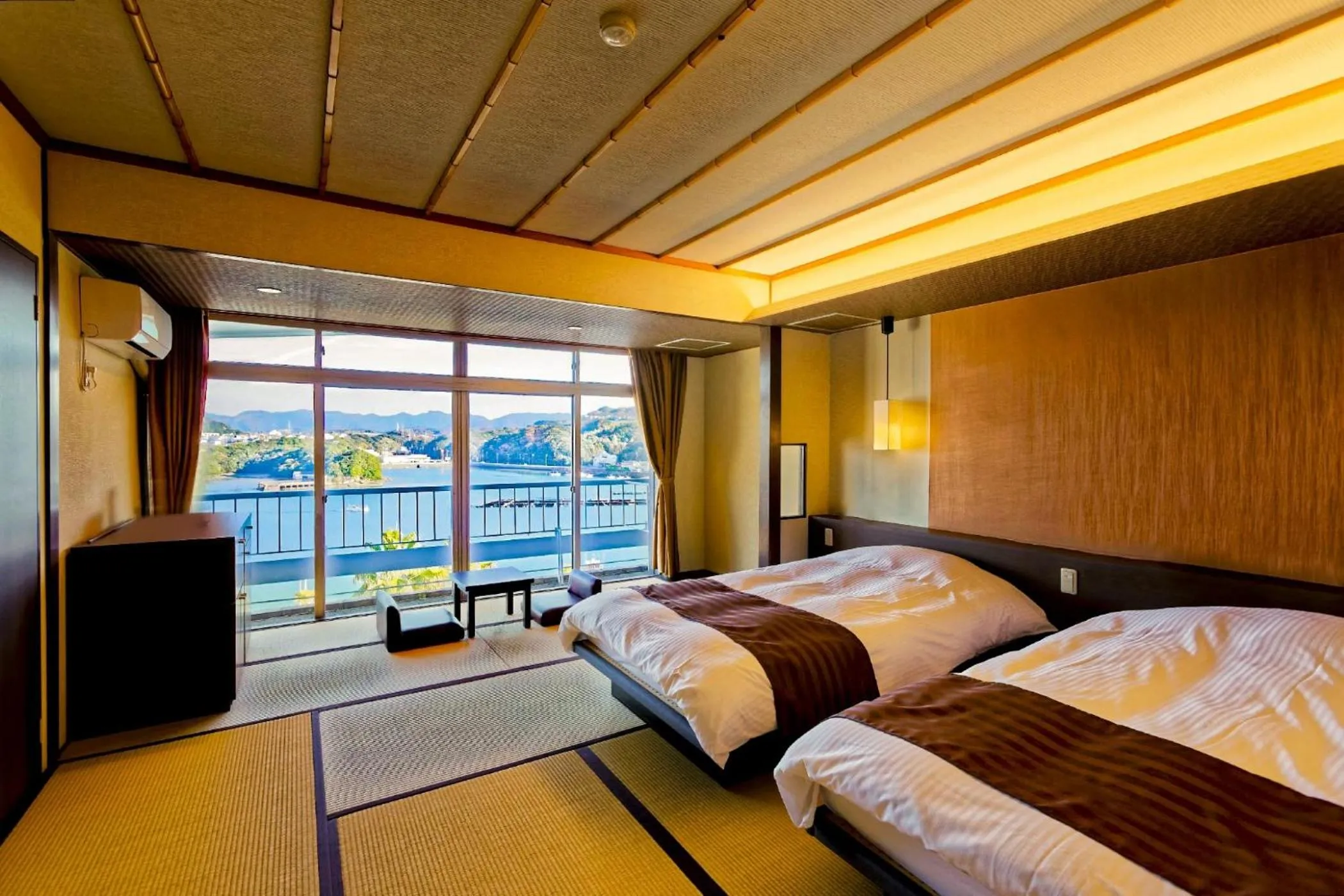 Photo of the whole room, Bed in Ooedo Onsen Monogatari Premium Shirahama Saichoraku