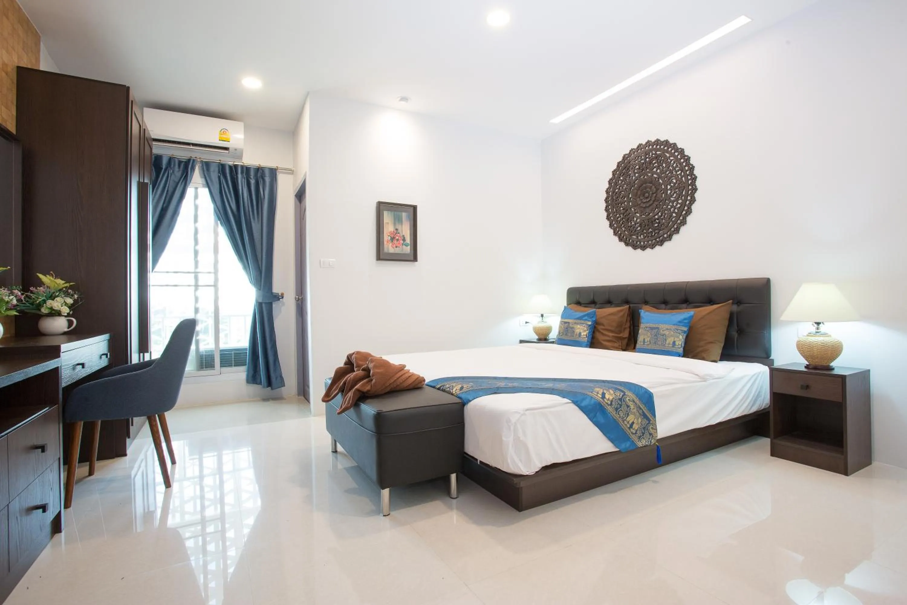 Photo of the whole room, Bed in Pongsakorn Boutique Resort