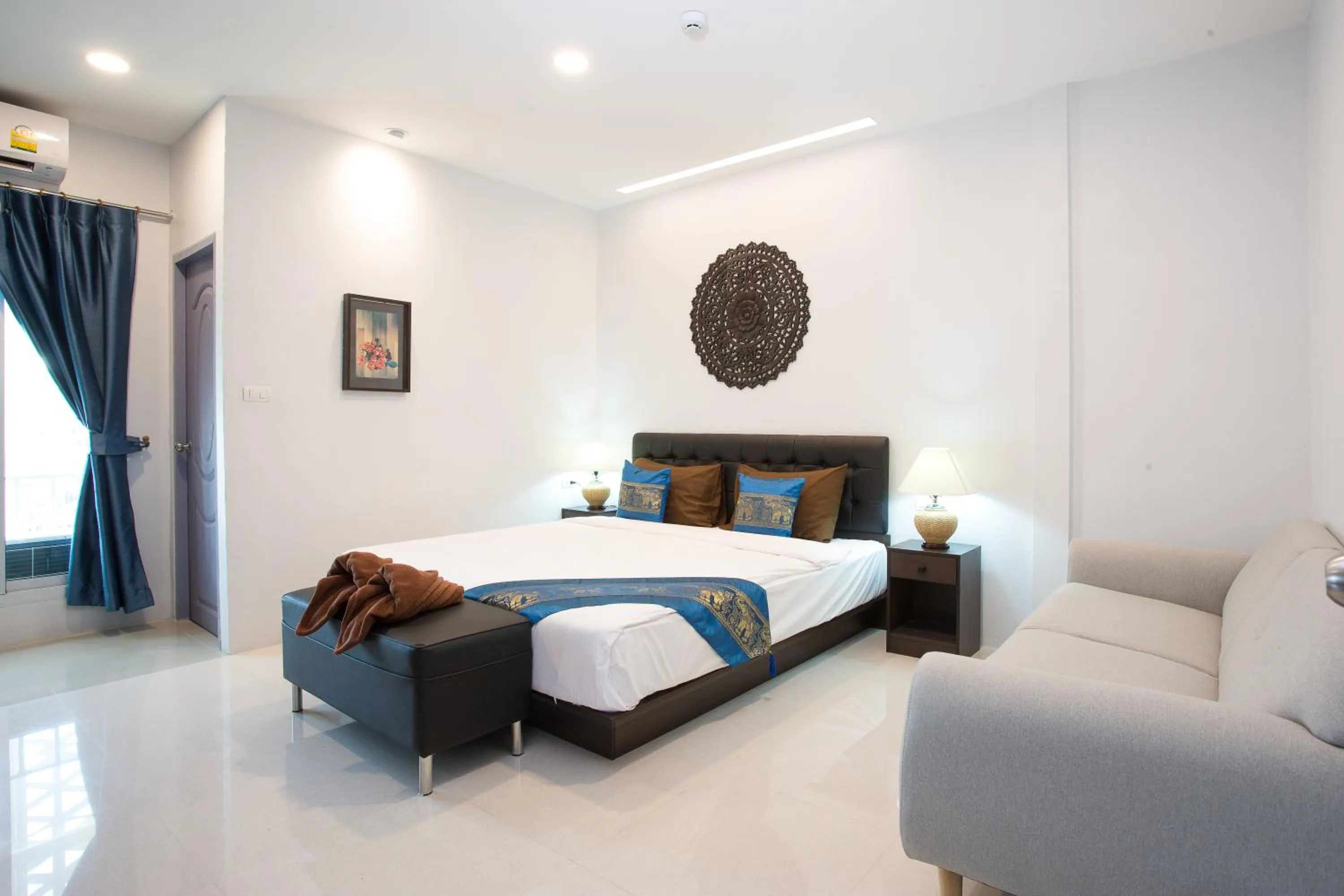 Photo of the whole room, Bed in Pongsakorn Boutique Resort