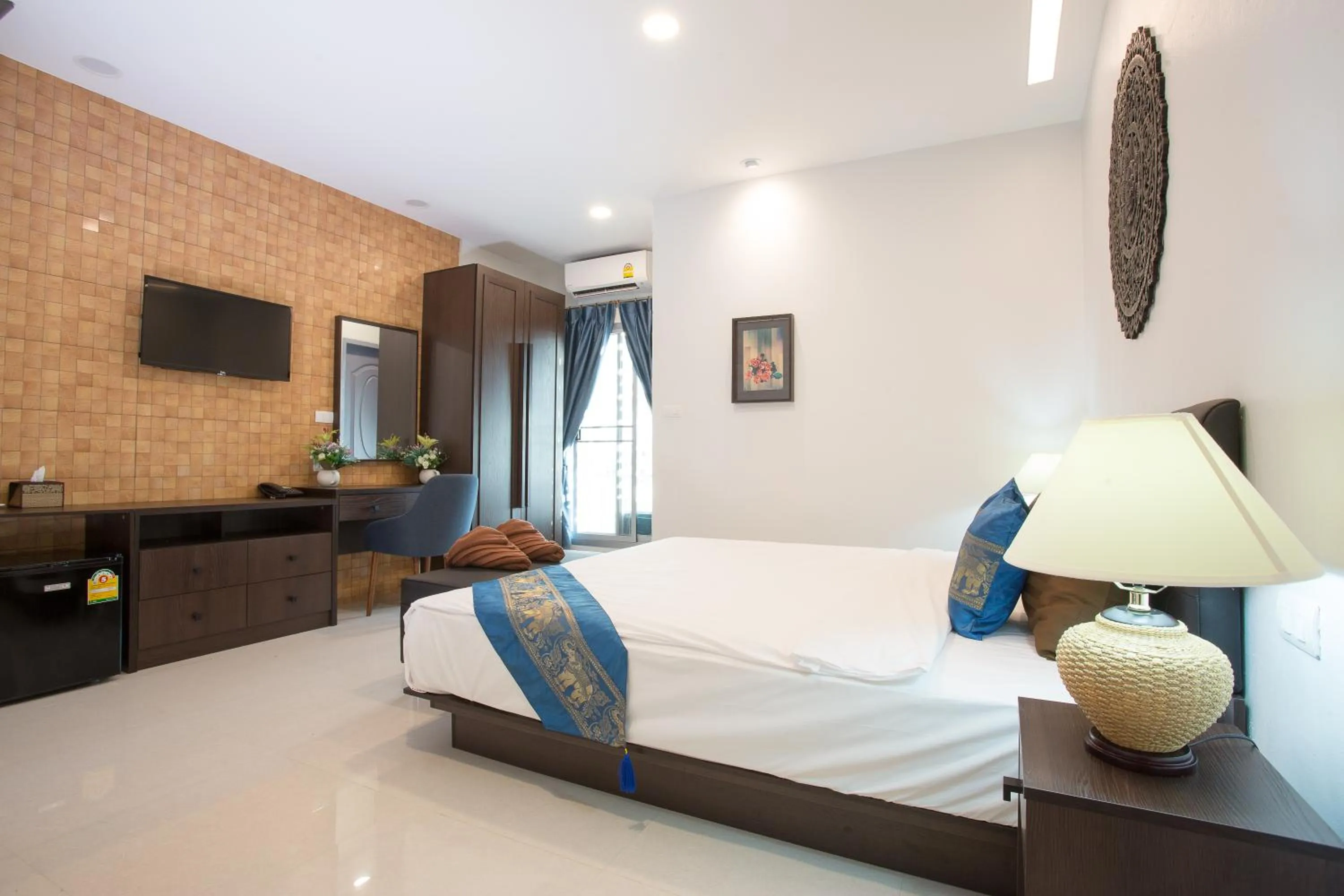 Photo of the whole room, Bed in Pongsakorn Boutique Resort
