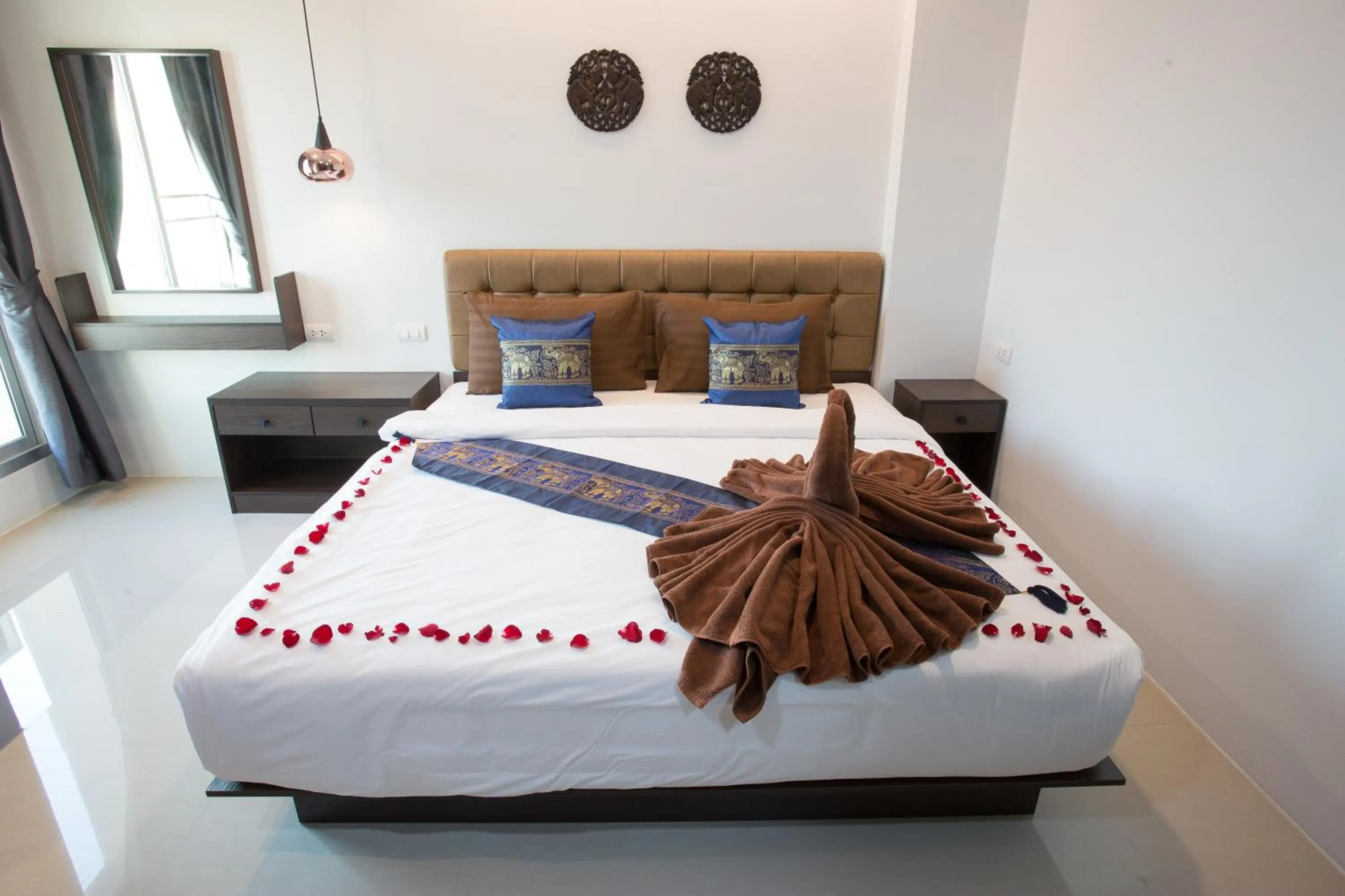 Decorative detail, Bed in Pongsakorn Boutique Resort