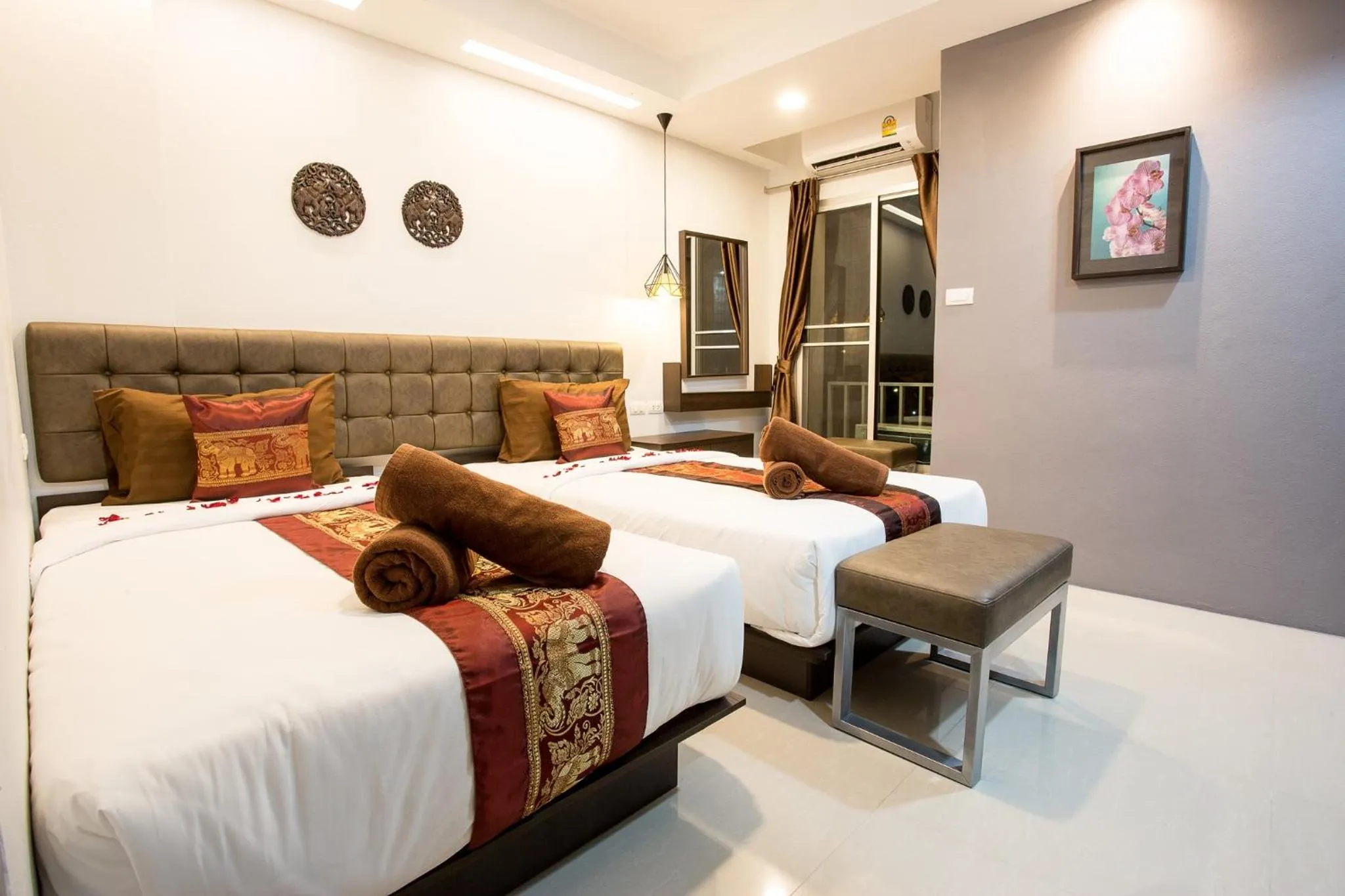 Photo of the whole room, Bed in Pongsakorn Boutique Resort
