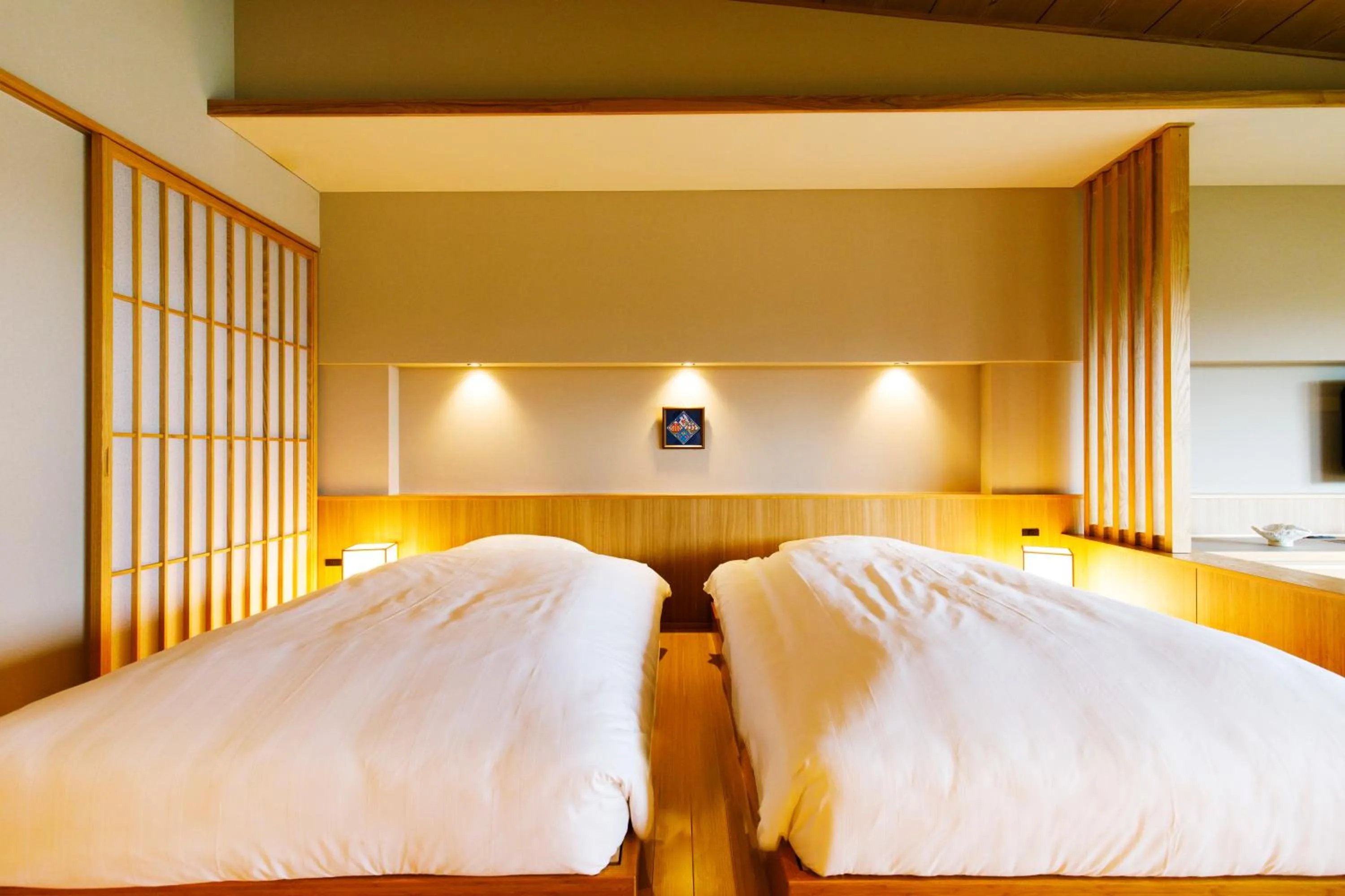 Bed in Umino Ryotei Okinawa Nakamasou