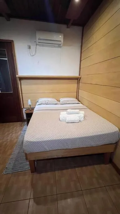 Bed in Albergaria Porcelana