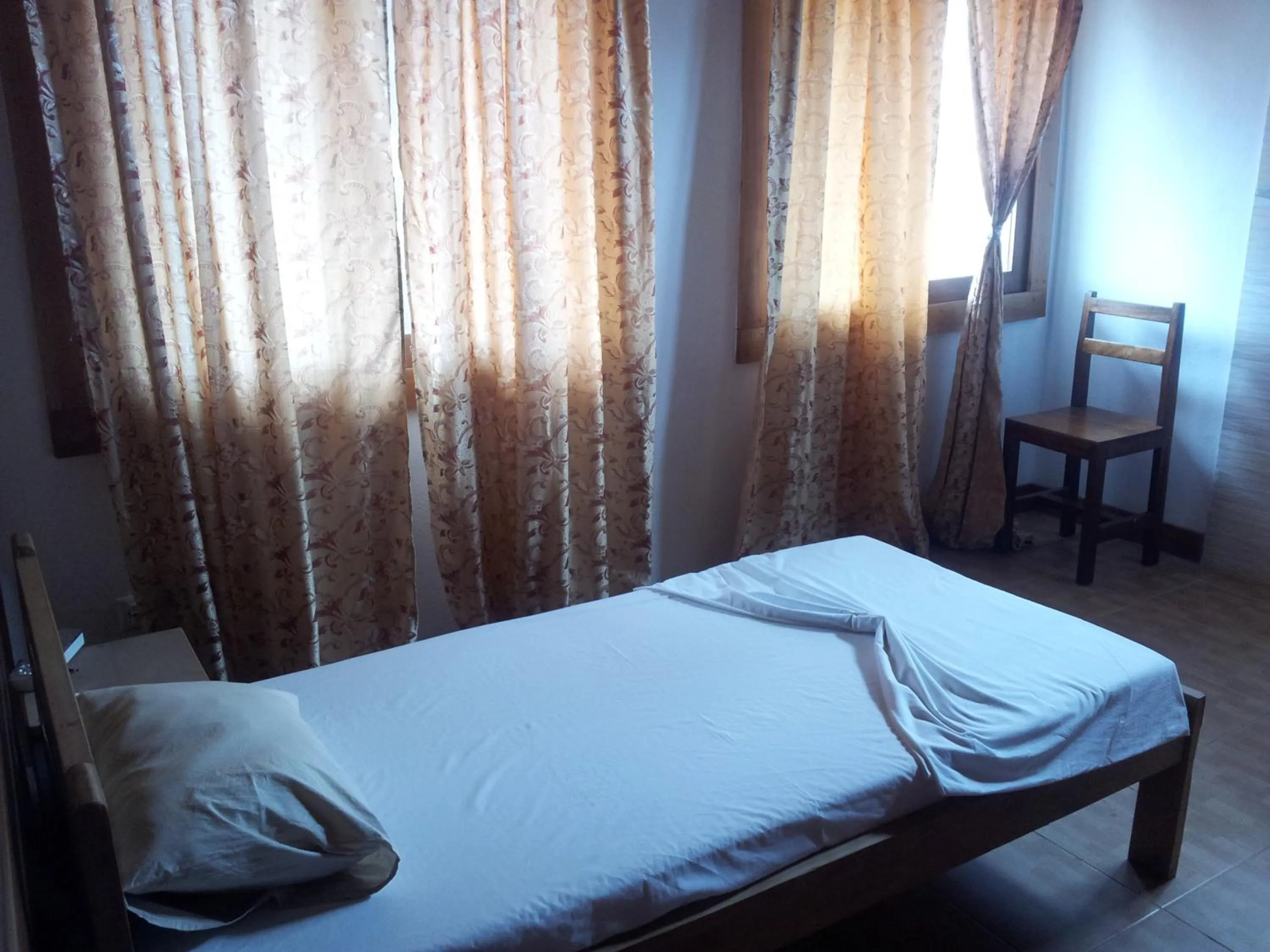 Bed in Albergaria Porcelana