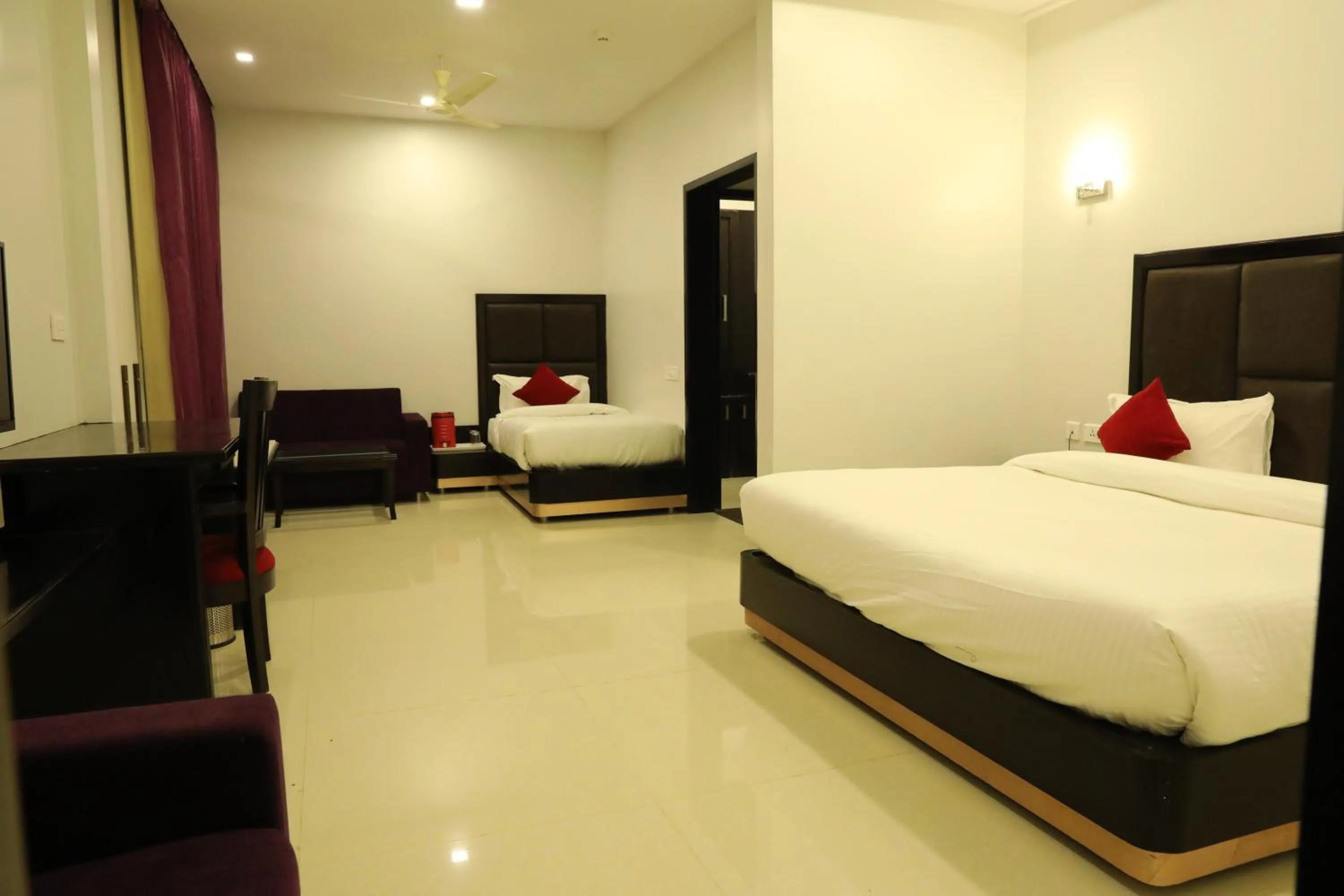 Photo of the whole room, Bed in Chandra Grand