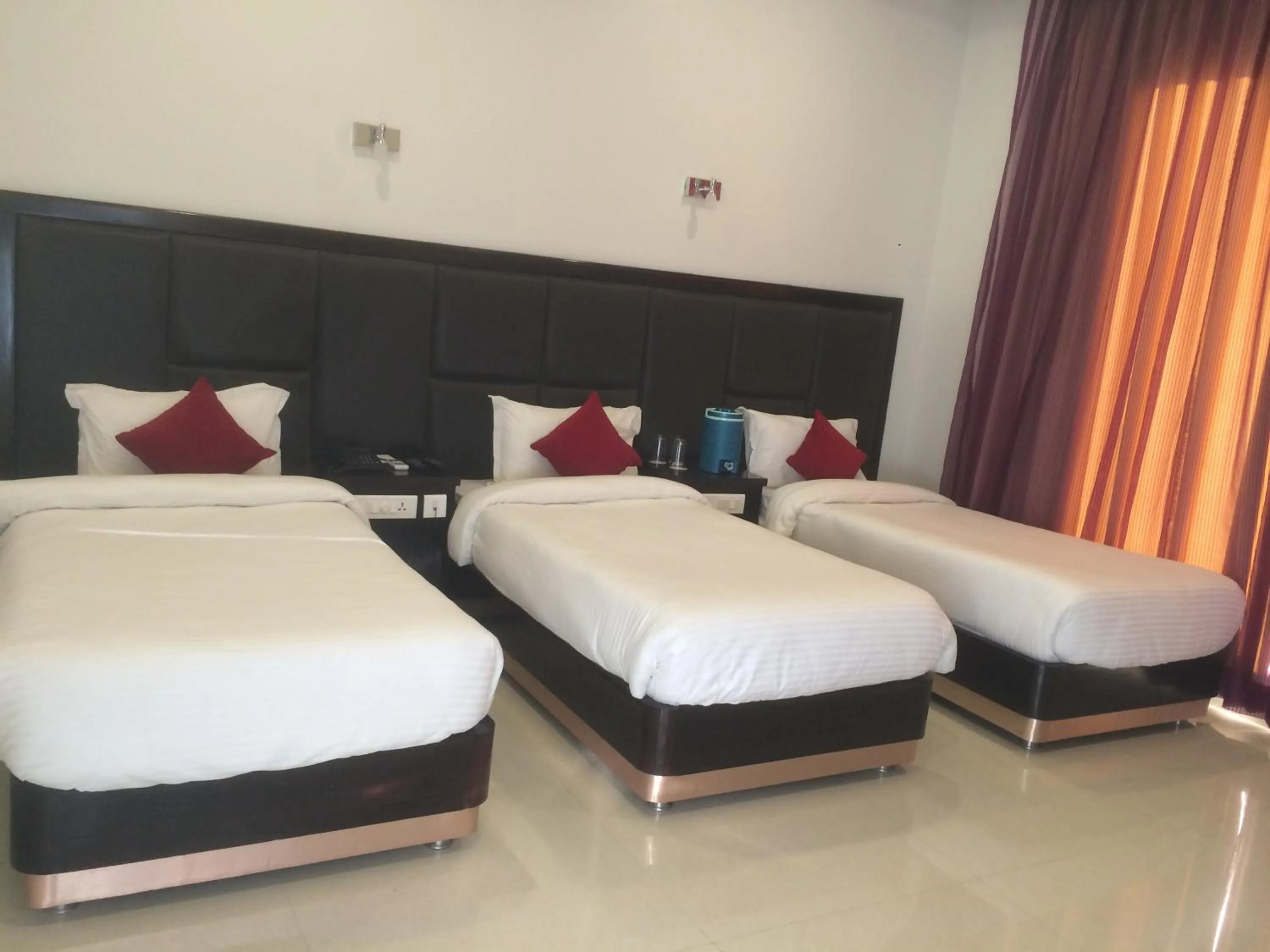 Photo of the whole room, Bed in Chandra Grand